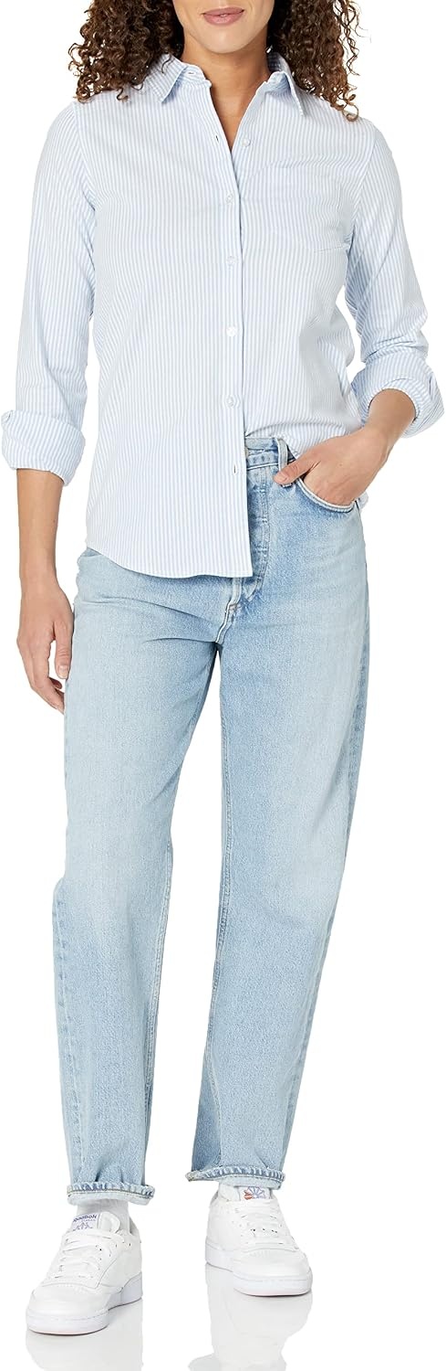 image:imageAmazon Essentials Womens Long Sleeve Button Down Stretch Oxford Shirt Available in Plus SizeBlue White Vertical Stripe