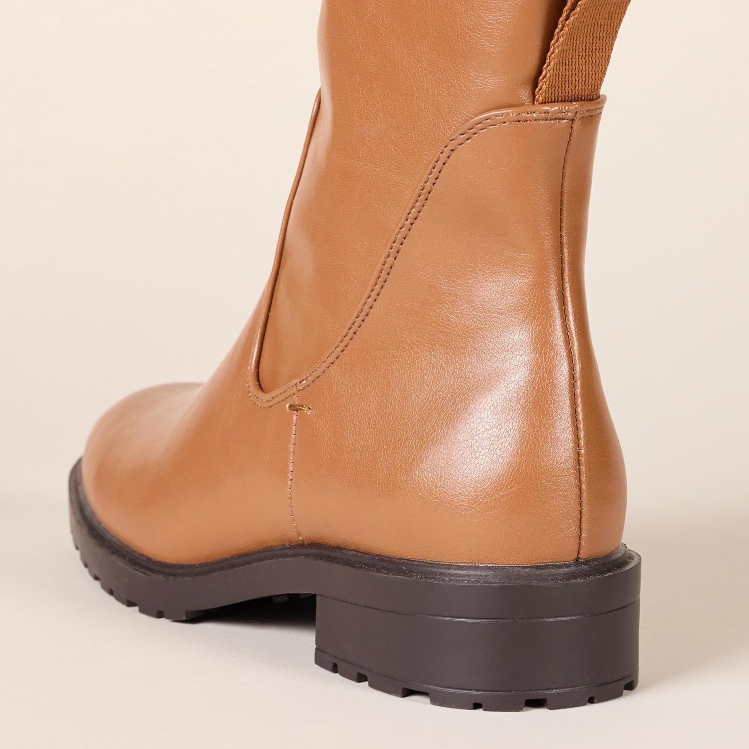 image:imageAmazon Essentials Womens Knee High Riding BootBlack Dark Caramel Faux Leather