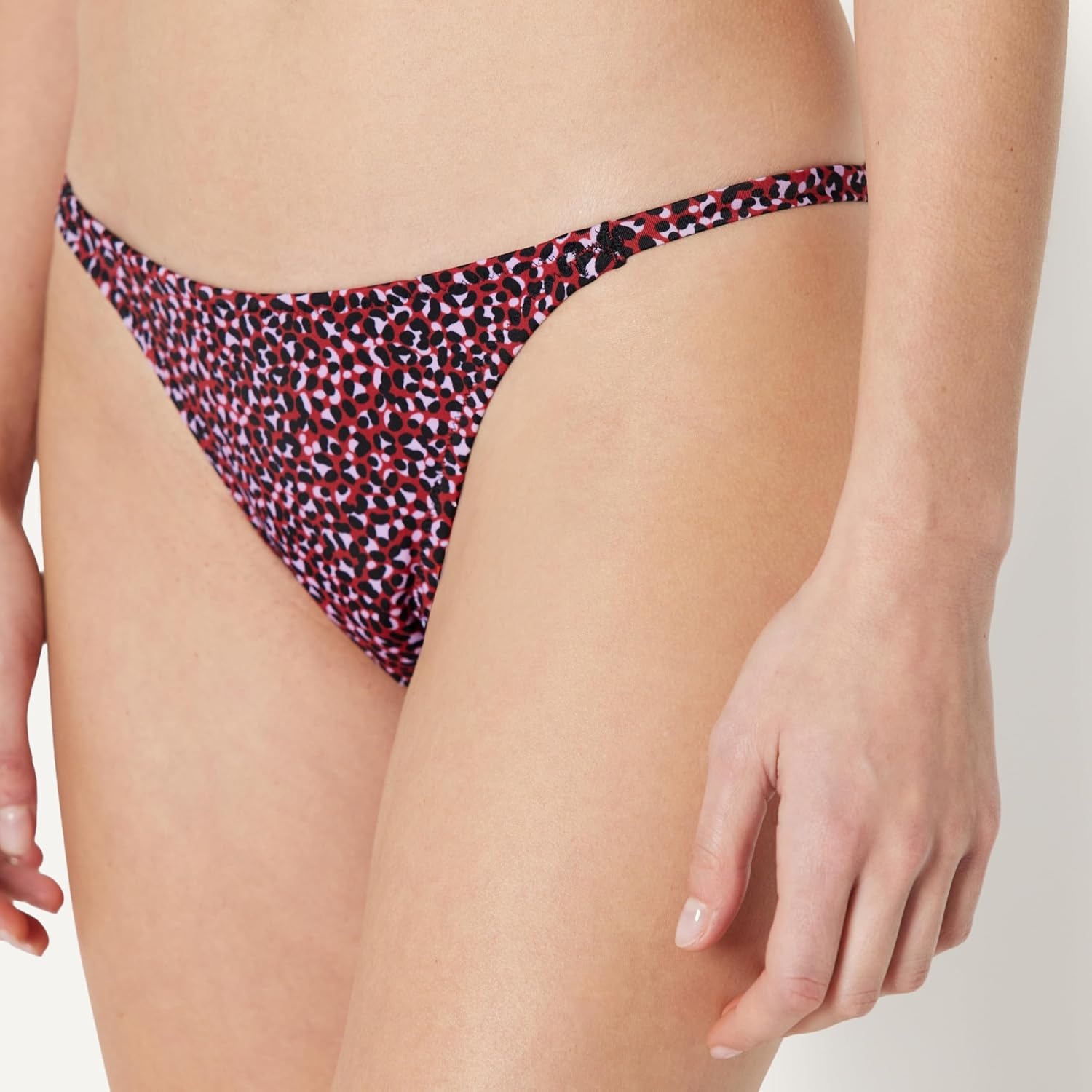 image:imageAmazon Essentials Womens Low Rise Notie String Swim Bikini BottomBrick Red Lilac Leopard