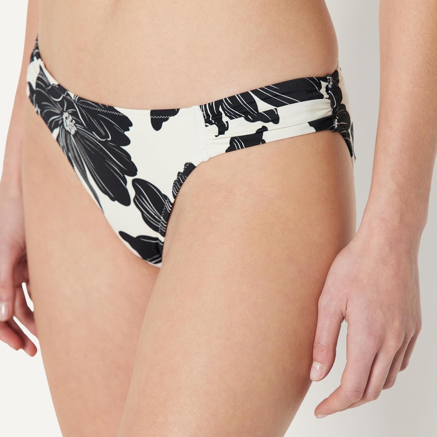 image:imageAmazon Essentials Womens Ruched Side Tab Full Coverage Bikini Swimsuit BottomCream Black Floral