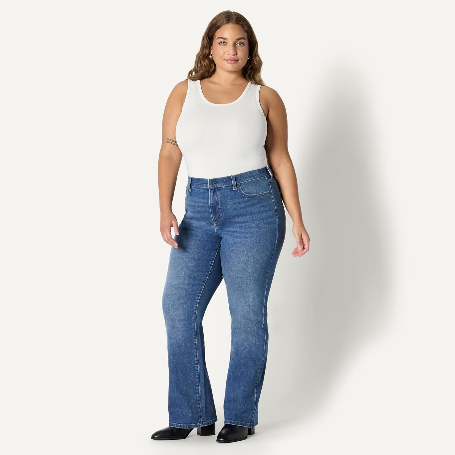 image:imageAmazon Essentials Womens Curvy SlimFit MidRise Bootcut JeansClassic Medium Wash