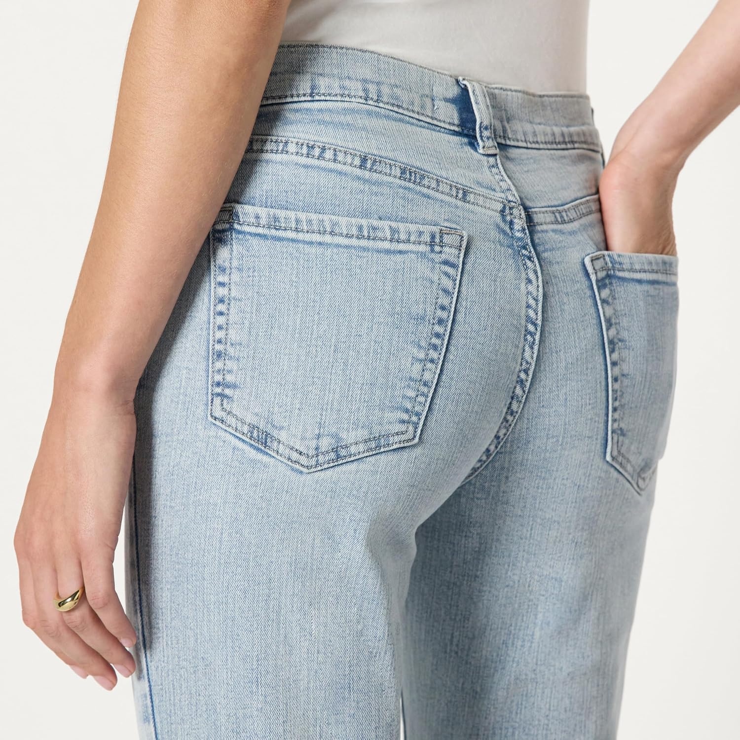 image:imageAmazon Essentials Womens Curvy SlimFit MidRise Bootcut JeansTinted Ice Light Wash