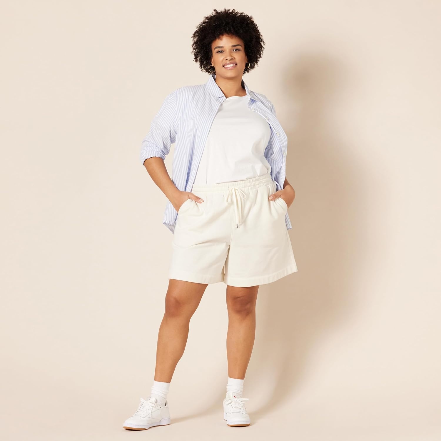image:imageAmazon Essentials Womens Fleece High Rise Bermuda Shorts with Elastic Waist and Drawstring Plus Size AvailableEggshell White