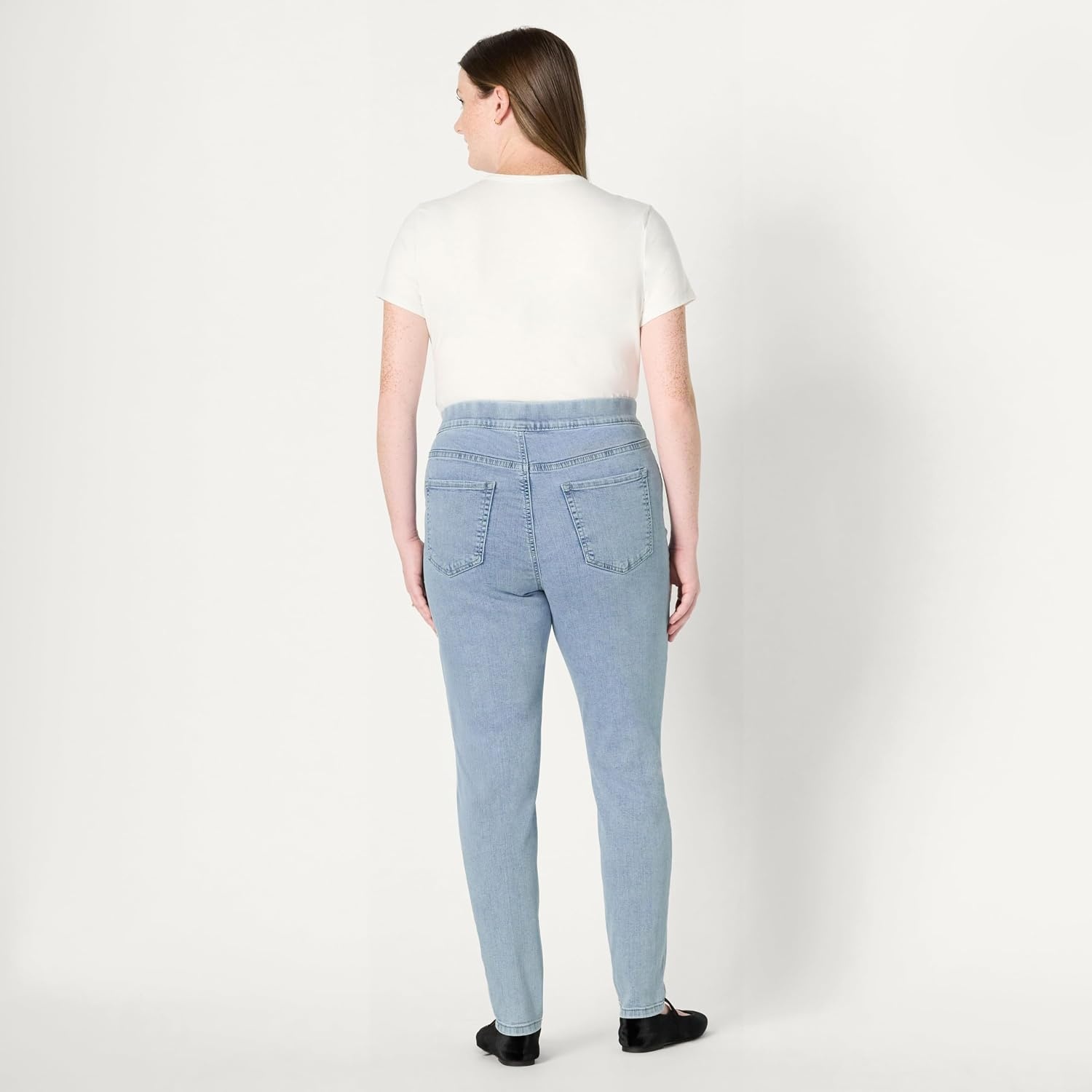 image:imageAmazon Essentials Womens Stretch Denim MidRise PullOn Skinny JeggingIced Light Wash