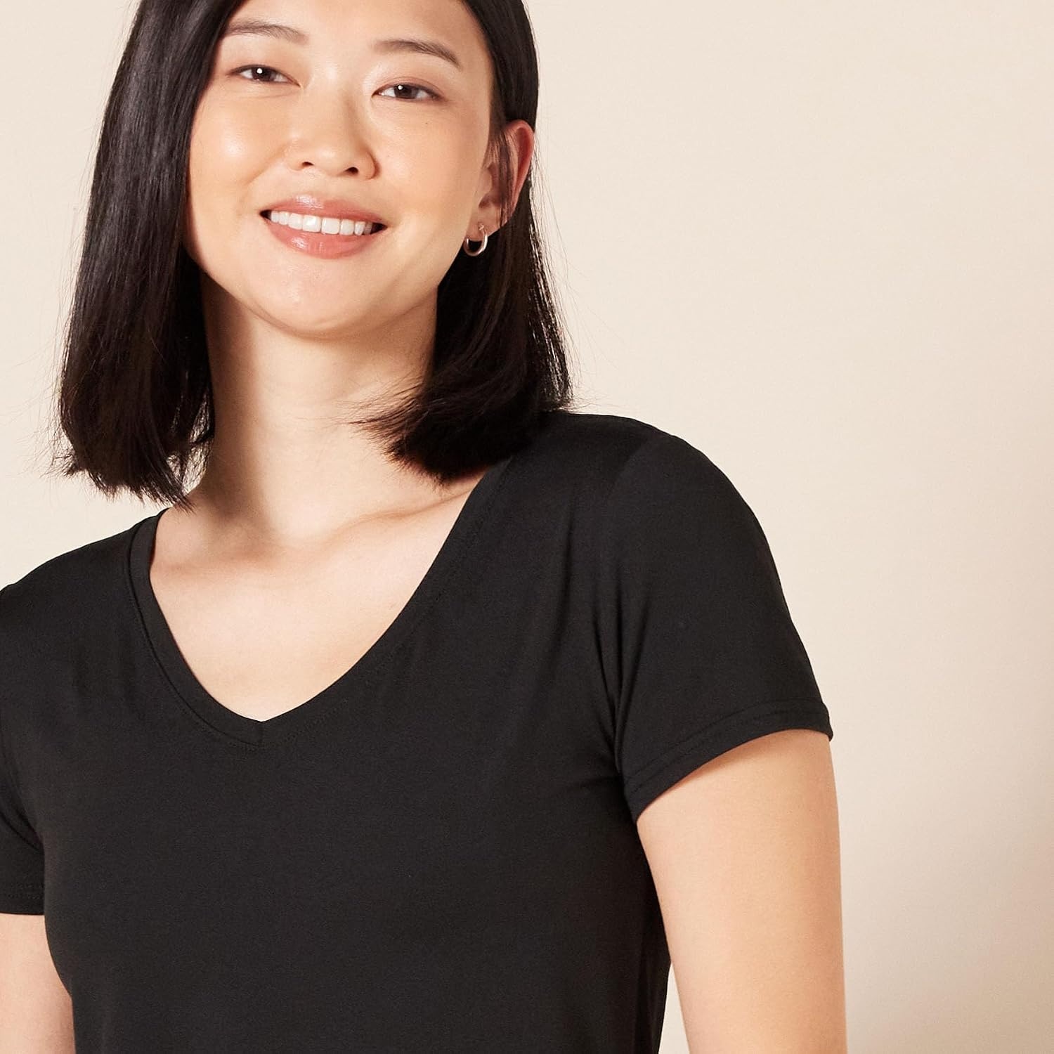 image:imageAmazon Essentials Womens Active Quick Dry Tech Stretch ShortSleeve VNeck TShirt MoistureWicking Pack of 2BlackBright White