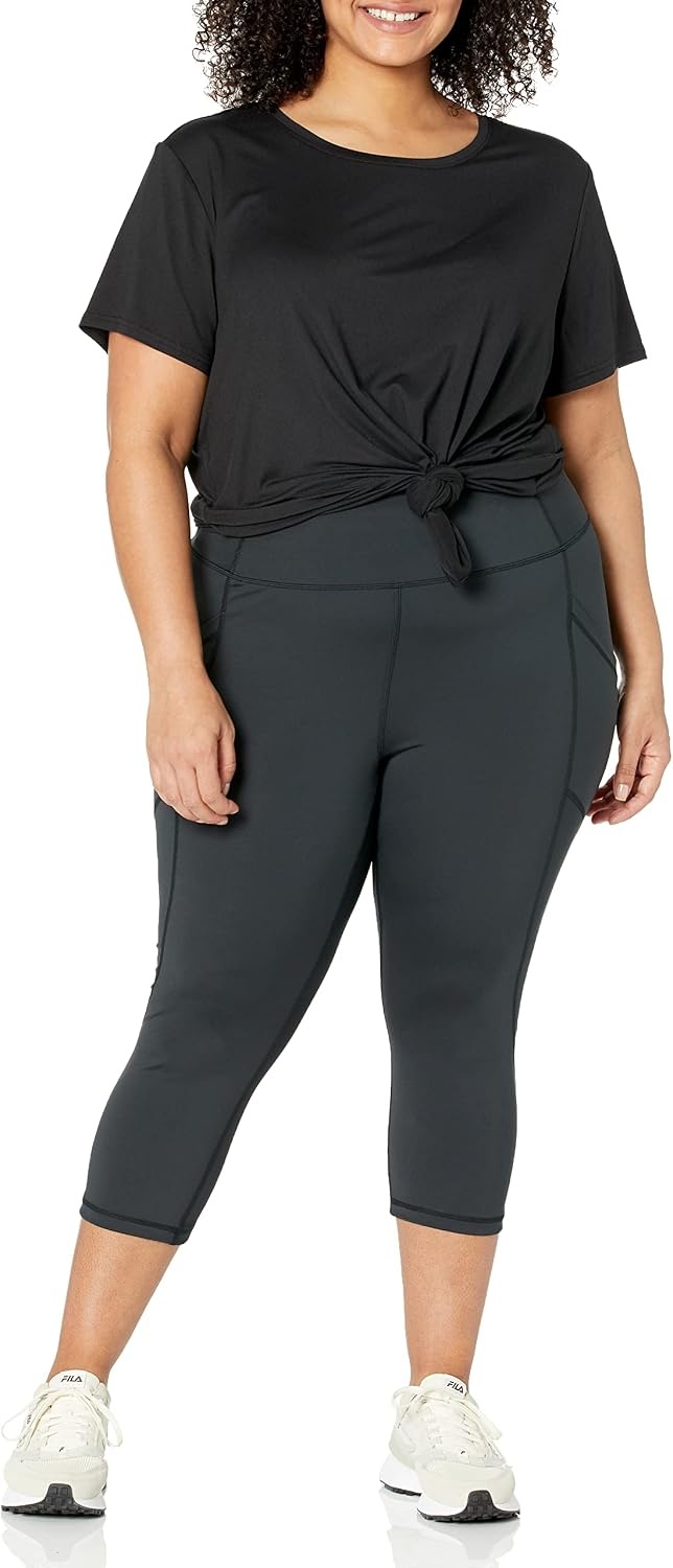 image:imageAmazon Essentials Womens Active Quick Dry Tech Stretch ShortSleeve VNeck TShirt MoistureWicking Pack of 2BlackBright White