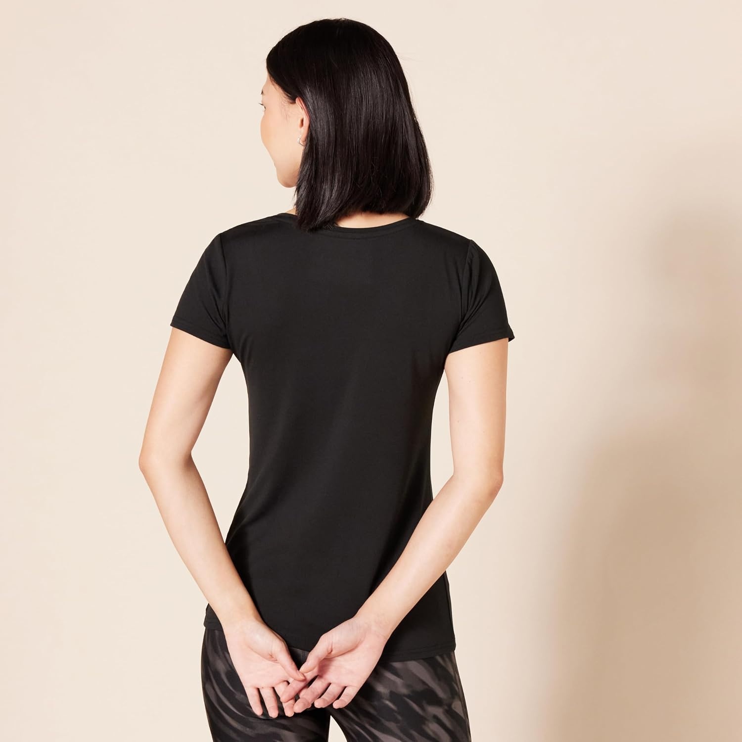image:imageAmazon Essentials Womens Active Quick Dry Tech Stretch ShortSleeve VNeck TShirt MoistureWicking Pack of 2BlackBright White