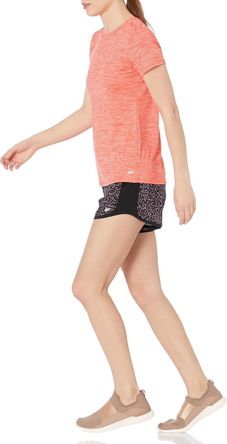 image:imageAmazon Essentials Womens Active Quick Dry Tech Stretch ShortSleeve VNeck TShirt MoistureWicking Pack of 2Coral Orange Space DyeLight Blue Space Dye