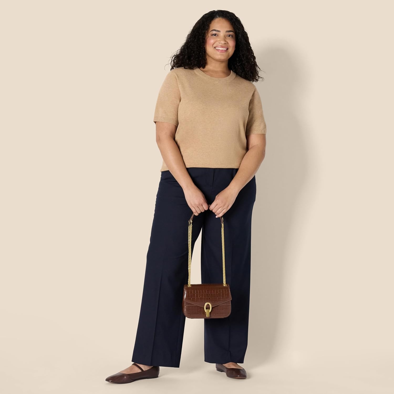 image:imageAmazon Essentials Womens RegularFit Cap Sleeve Mock Neck Sweater TopCamel Heather
