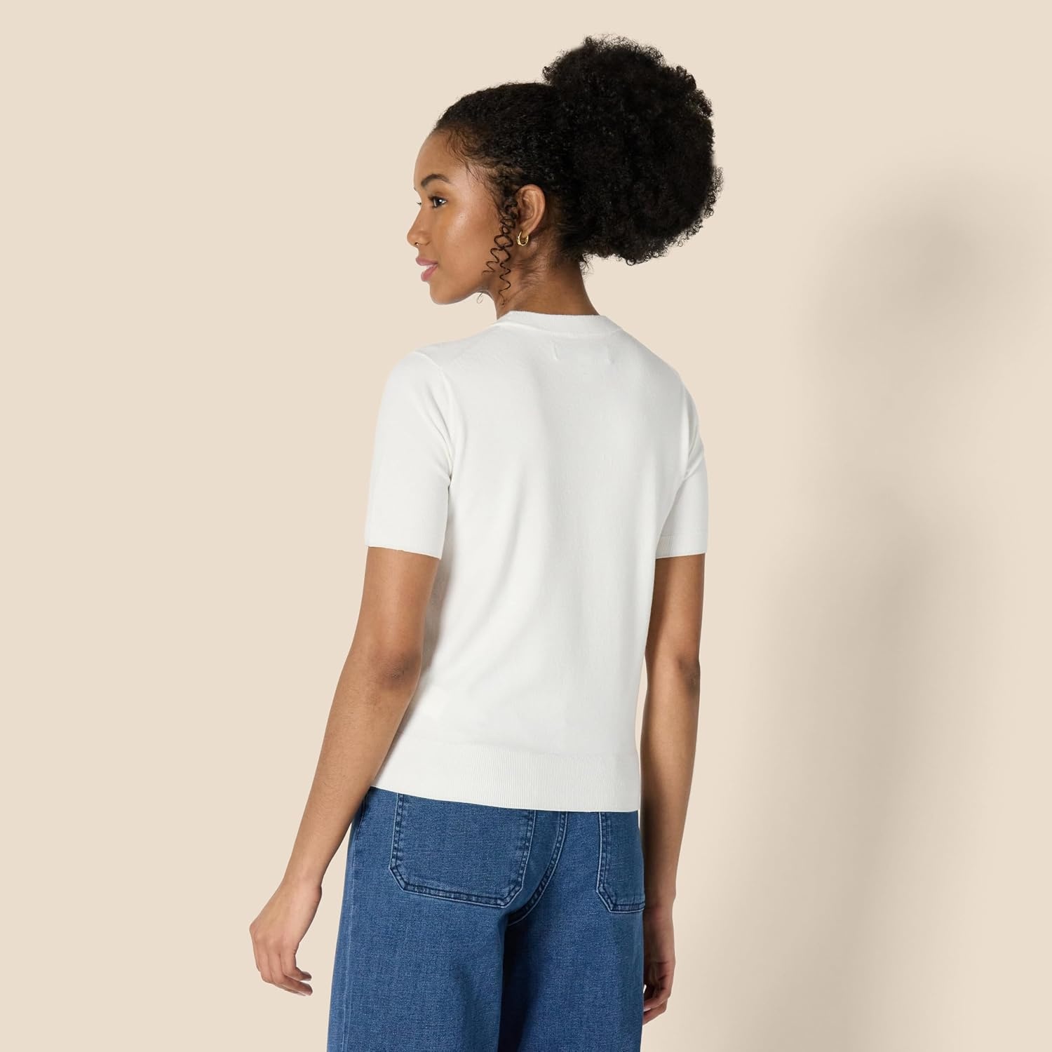 image:imageAmazon Essentials Womens RegularFit Cap Sleeve Mock Neck Sweater TopEggshell White