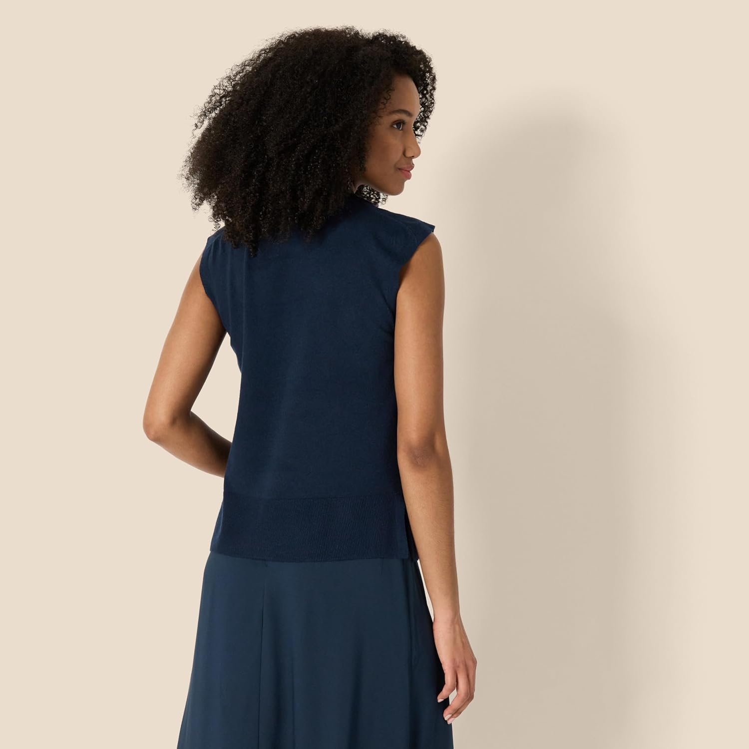 image:imageAmazon Essentials Womens RegularFit Cap Sleeve Mock Neck Sweater TopNavy