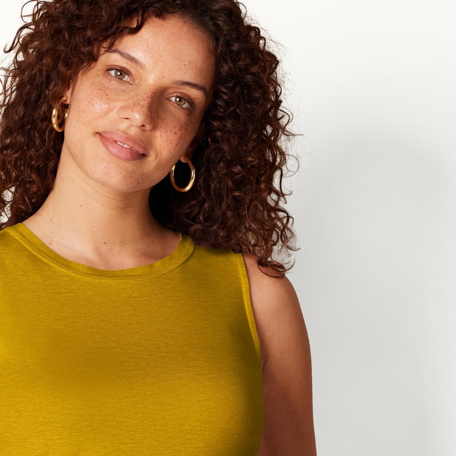 image:imageAmazon Essentials Womens RelaxedFit Loose Fit Sleeveless Muscle Tank TopDark Yellow