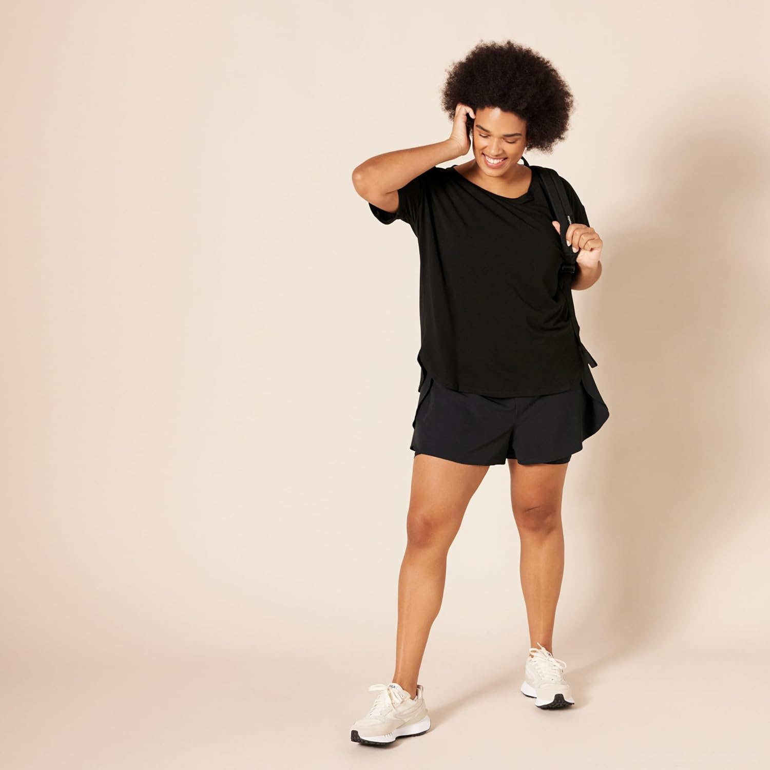 image:imageAmazon Essentials Womens Studio RelaxedFit Lightweight Crewneck TShirt Available in Plus SizeBlack