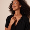 Amazon Essentials Women’s Relaxed-Fit Short-Sleeve V Neck Button-Front Woven Blouse, Business Casual Work Blouse(Black)