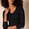 Amazon Essentials Women’s Slim-Fit Long Sleeve V-Neck Knit Rib Shirts (Available in Plus Size), Pack of 2(Eggshell White/Black)