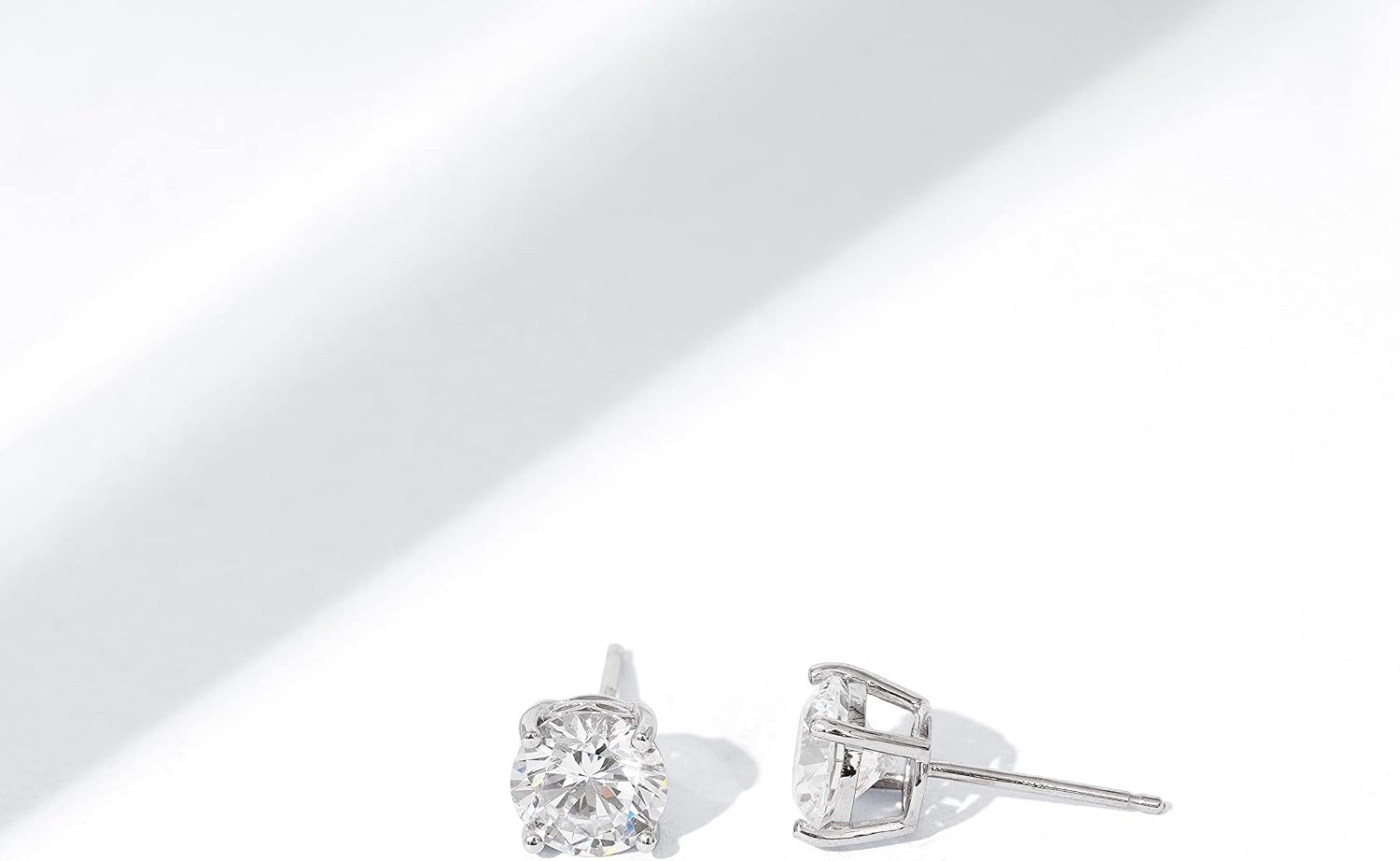 image:imageAmazon Essentials PlatinumPlated Sterling Silver Infinite Elements Cubic Zirconia RoundCut Stud Earrings Classic Jewelry