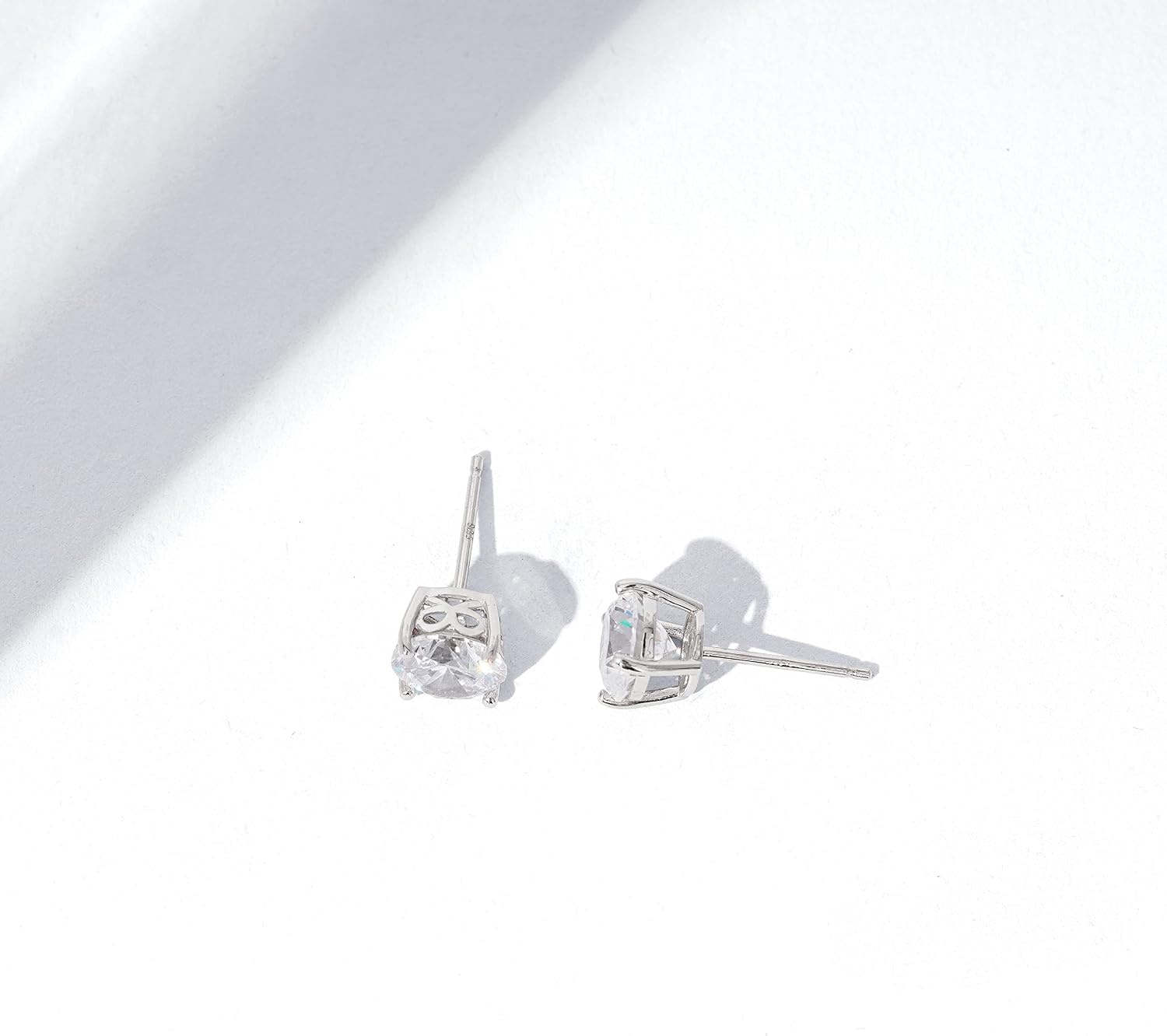 image:imageAmazon Essentials PlatinumPlated Sterling Silver Infinite Elements Cubic Zirconia RoundCut Stud Earrings Classic Jewelry