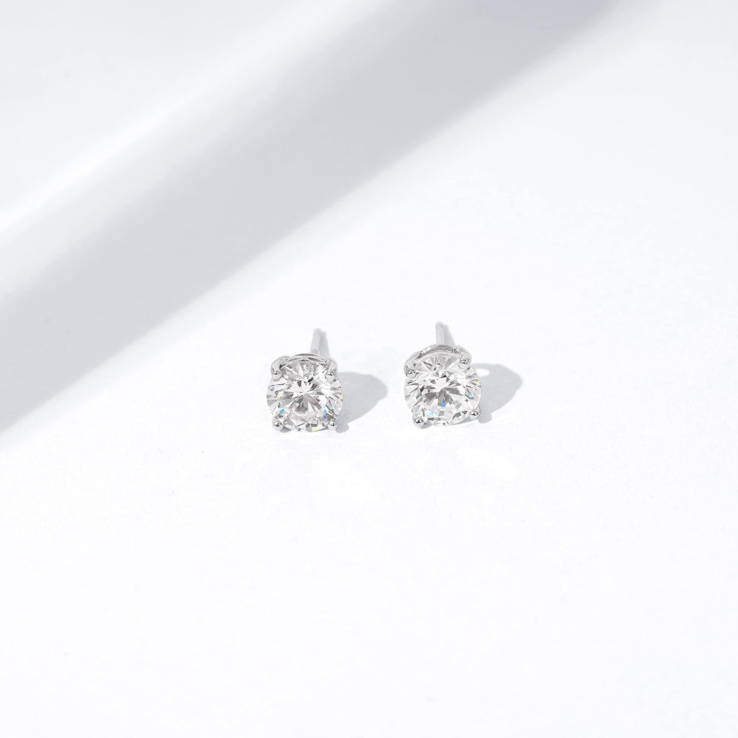 image:imageAmazon Essentials PlatinumPlated Sterling Silver Infinite Elements Cubic Zirconia RoundCut Stud Earrings Classic Jewelry