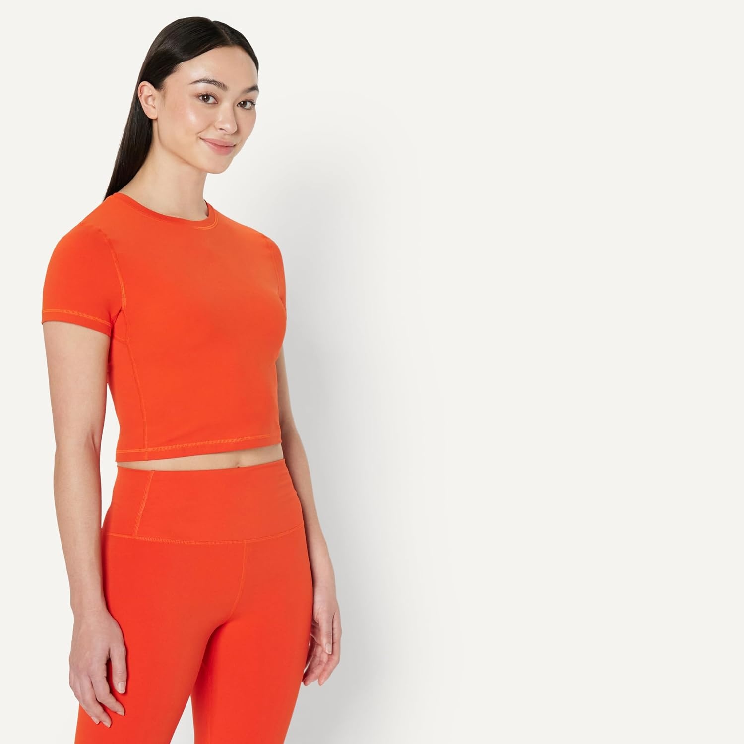 image:imageAmazon Essentials Womens Active FormFlex Buttery Soft Slim Fit Crop Layering Workout Top MoistureWickingBright Red