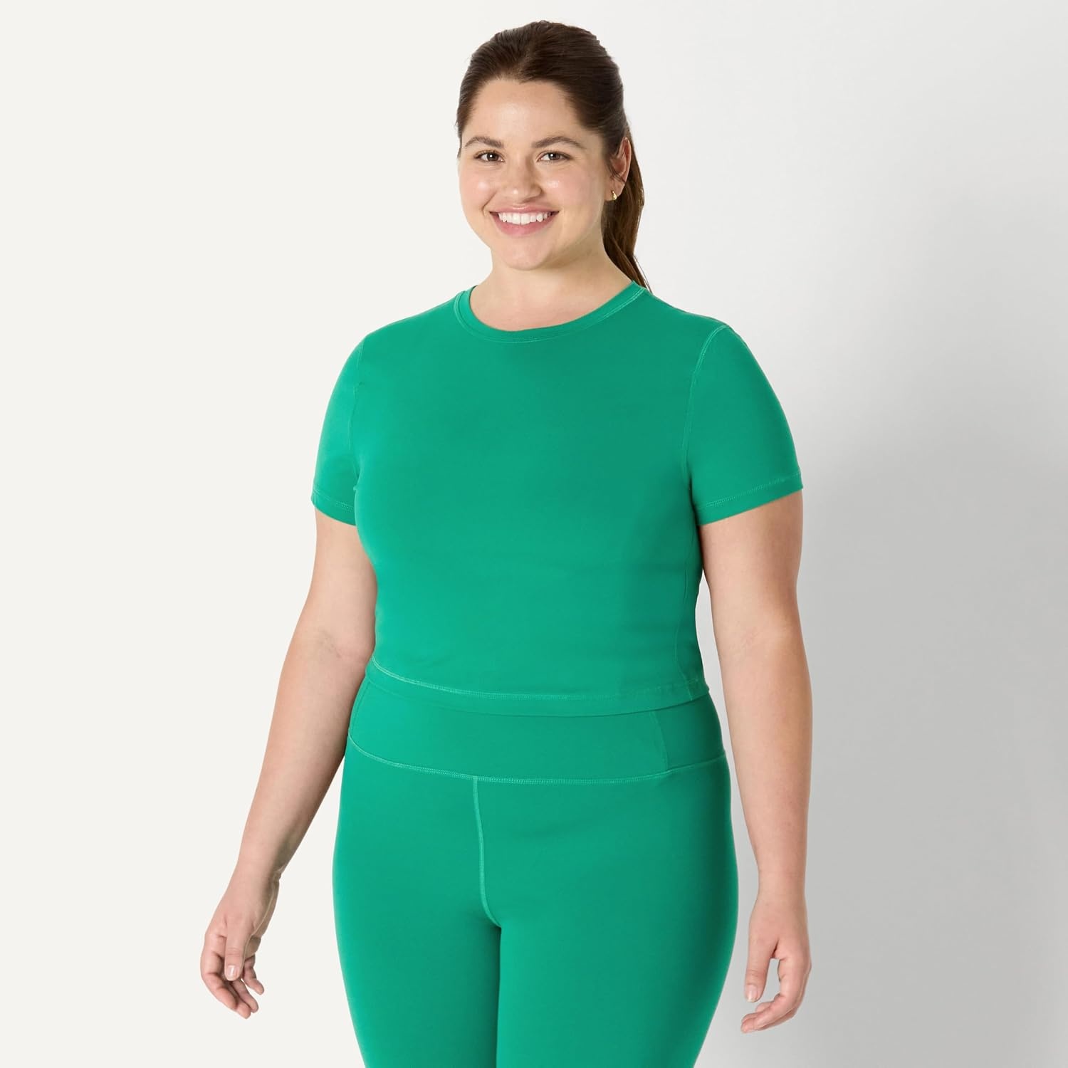 image:imageAmazon Essentials Womens Active FormFlex Buttery Soft Slim Fit Crop Layering Workout Top MoistureWickingEmerald Green