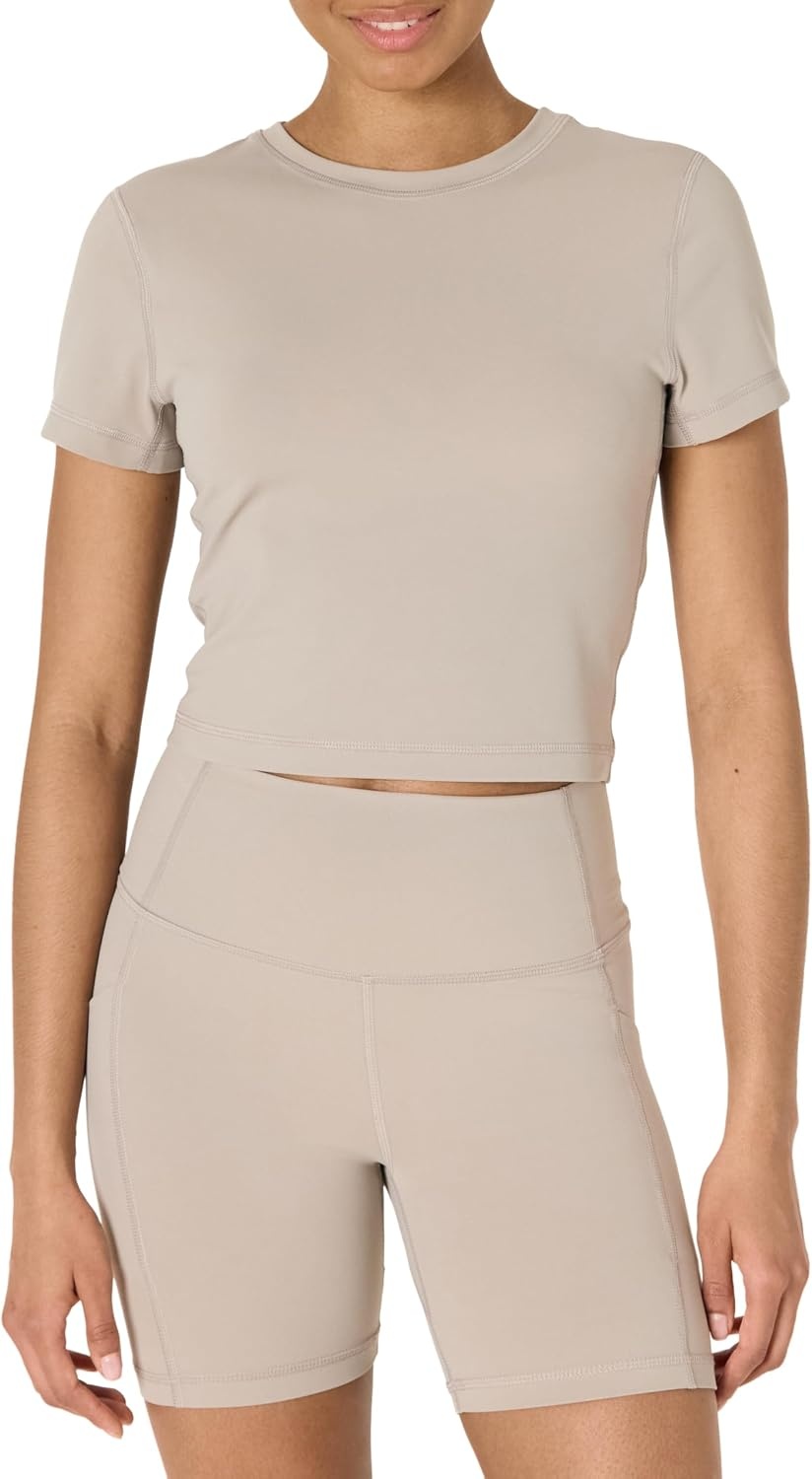image:imageAmazon Essentials Womens Active FormFlex Buttery Soft Slim Fit Crop Layering Workout Top MoistureWickingTaupe