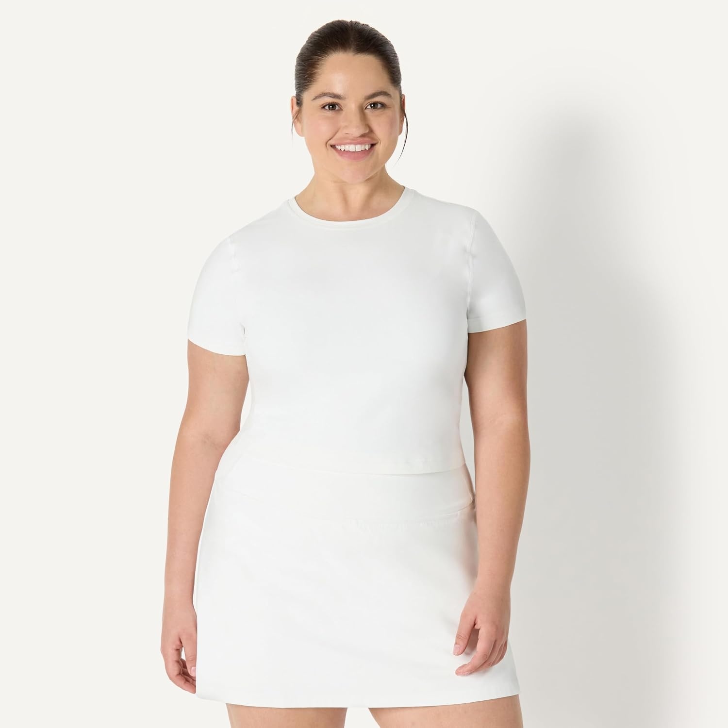 image:imageAmazon Essentials Womens Active FormFlex Buttery Soft Slim Fit Crop Layering Workout Top MoistureWickingWhite