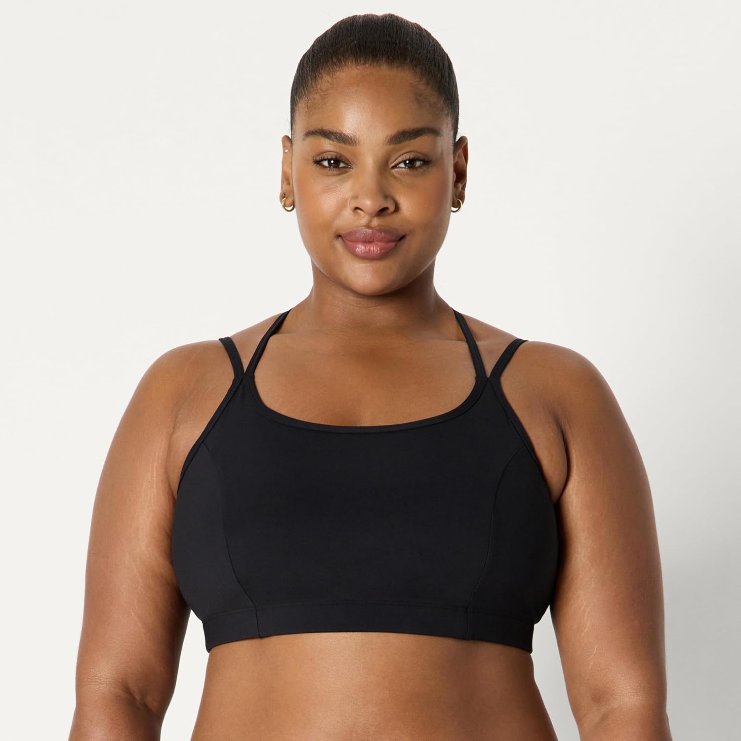 image:imageAmazon Essentials Womens Active Total Train Medium Support Sports Bra with Strappy BackBlack