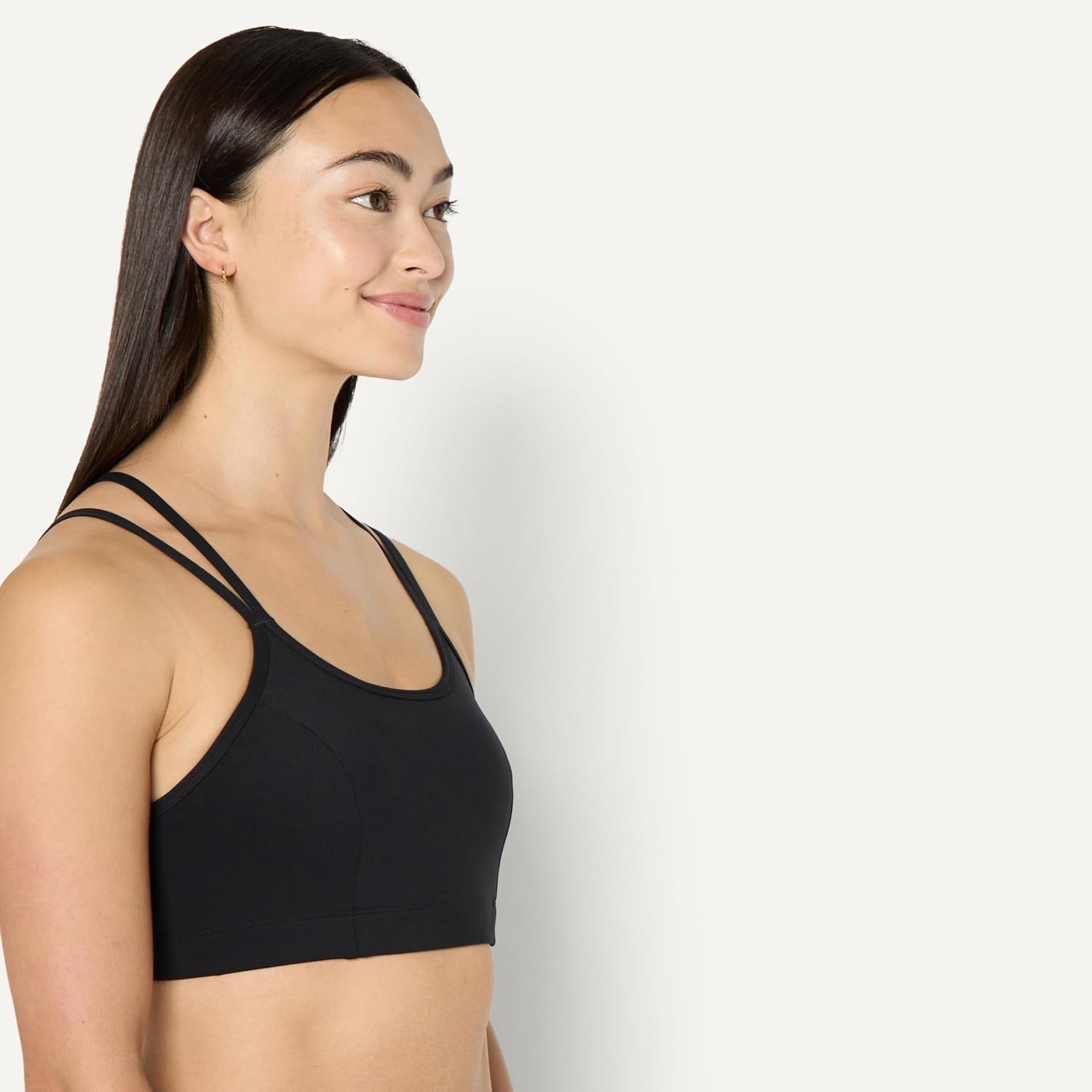 image:imageAmazon Essentials Womens Active Total Train Medium Support Sports Bra with Strappy BackBlack