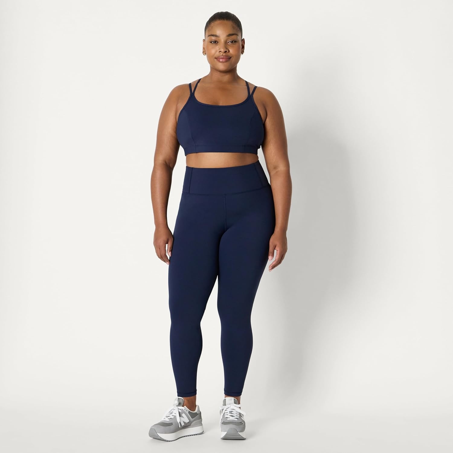 image:imageAmazon Essentials Womens Active Total Train Medium Support Sports Bra with Strappy BackNavy