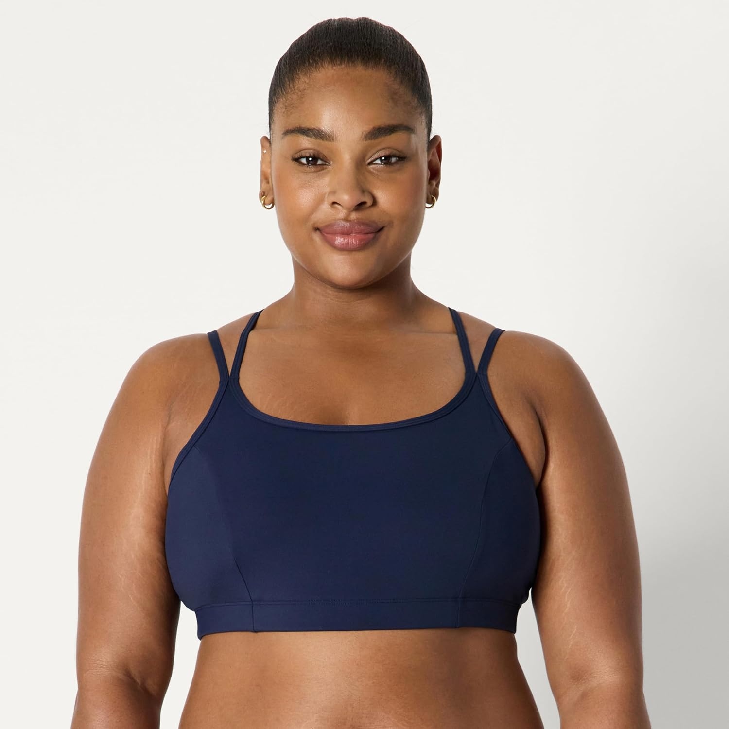 image:imageAmazon Essentials Womens Active Total Train Medium Support Sports Bra with Strappy BackNavy