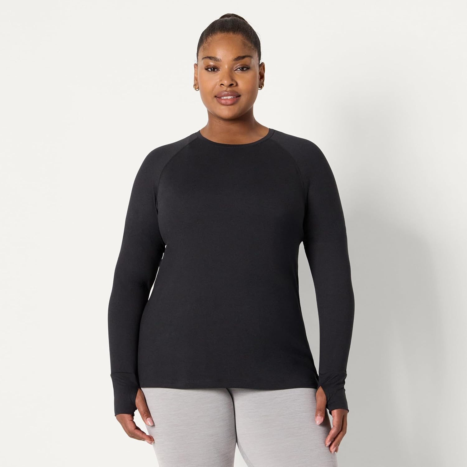 image:imageAmazon Essentials Womens Athletic Soft Performance Lightweight Stretch Long Sleeve Layering Workout Top with ThumbholesSpace Dye Black