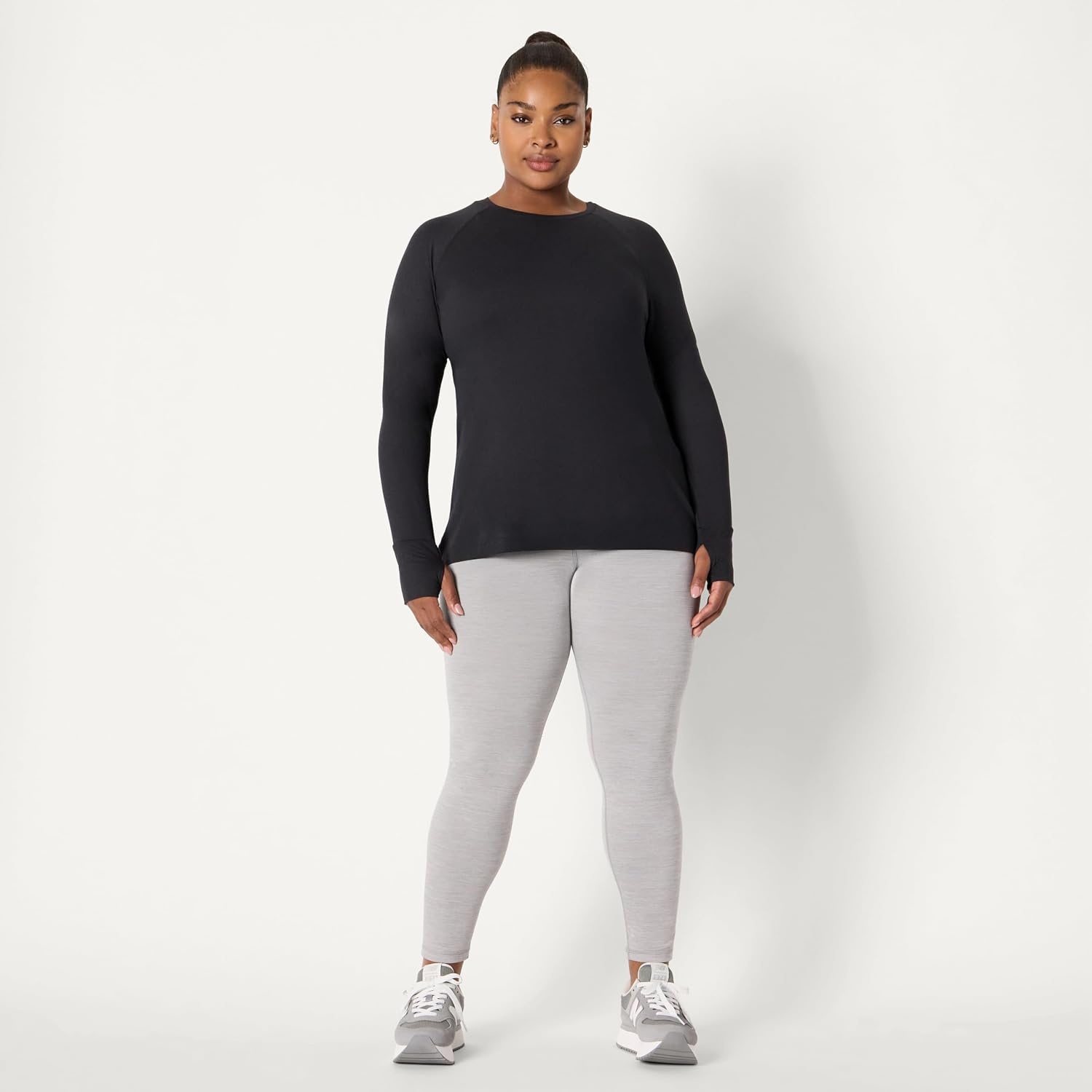 image:imageAmazon Essentials Womens Athletic Soft Performance Lightweight Stretch Long Sleeve Layering Workout Top with ThumbholesSpace Dye Black