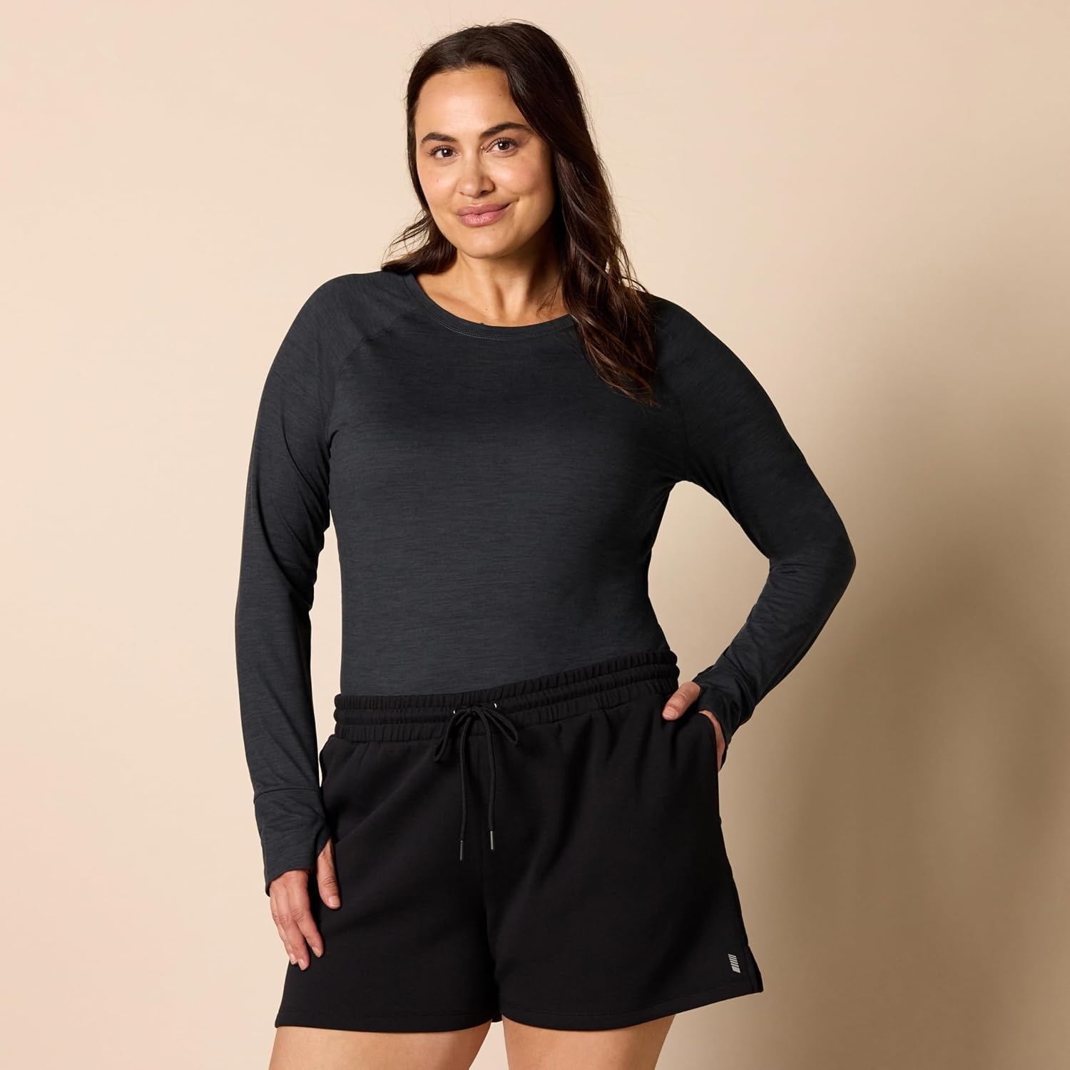 image:imageAmazon Essentials Womens Brushed Tech Stretch LongSleeve Crewneck Shirt Available in Plus SizeBlackSpace Dye
