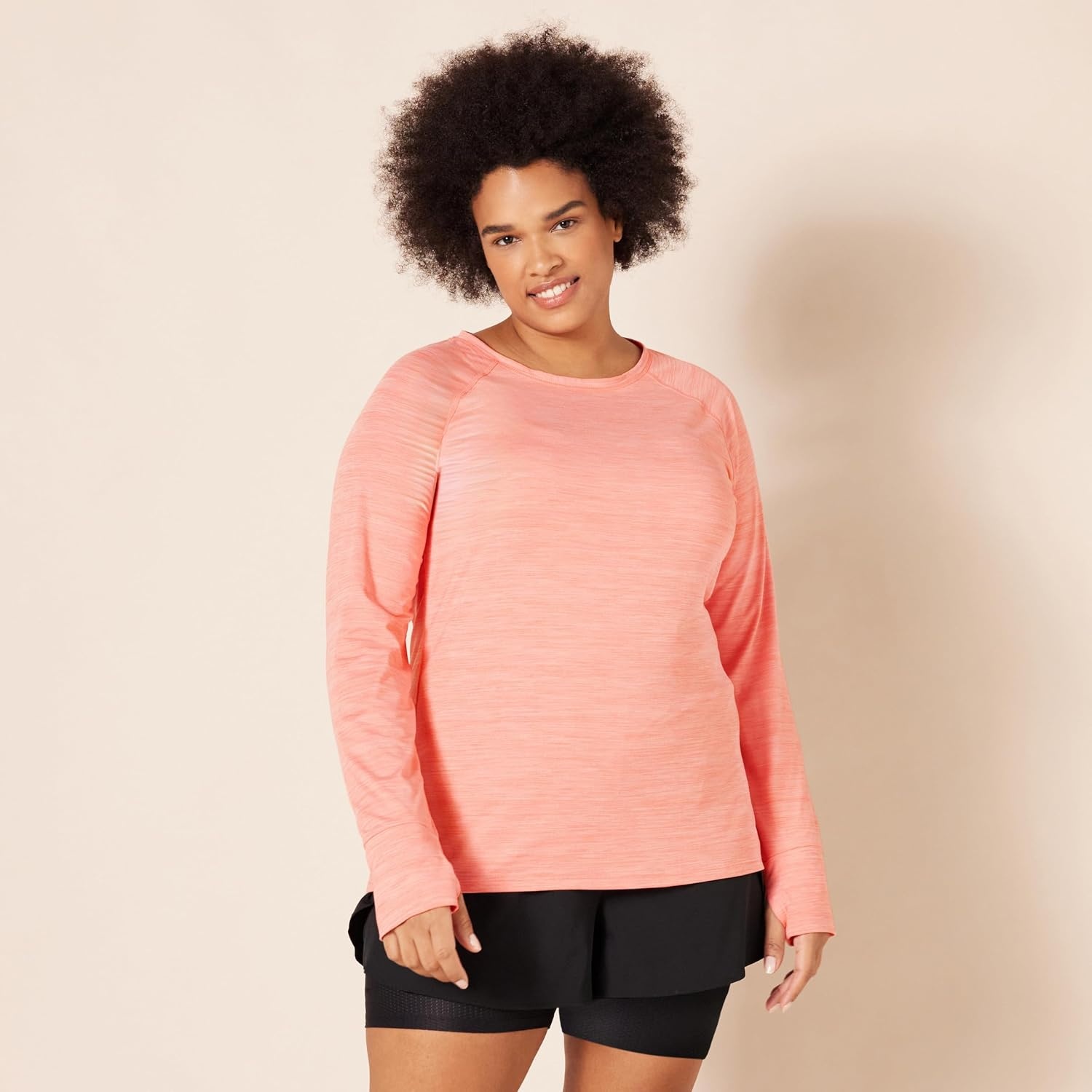 image:imageAmazon Essentials Womens Brushed Tech Stretch LongSleeve Crewneck Shirt Available in Plus SizeCoral Pink Space Dye