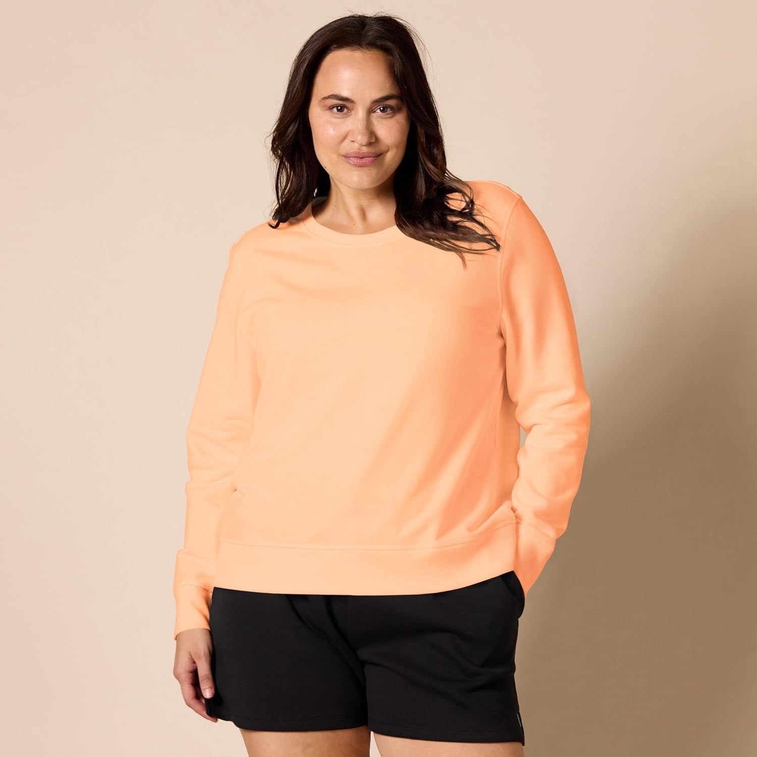 image:imageAmazon Essentials Womens Fleece Crewneck Long Sleeve Pullover Sweatshirt Available in Plus SizeCantaloupe