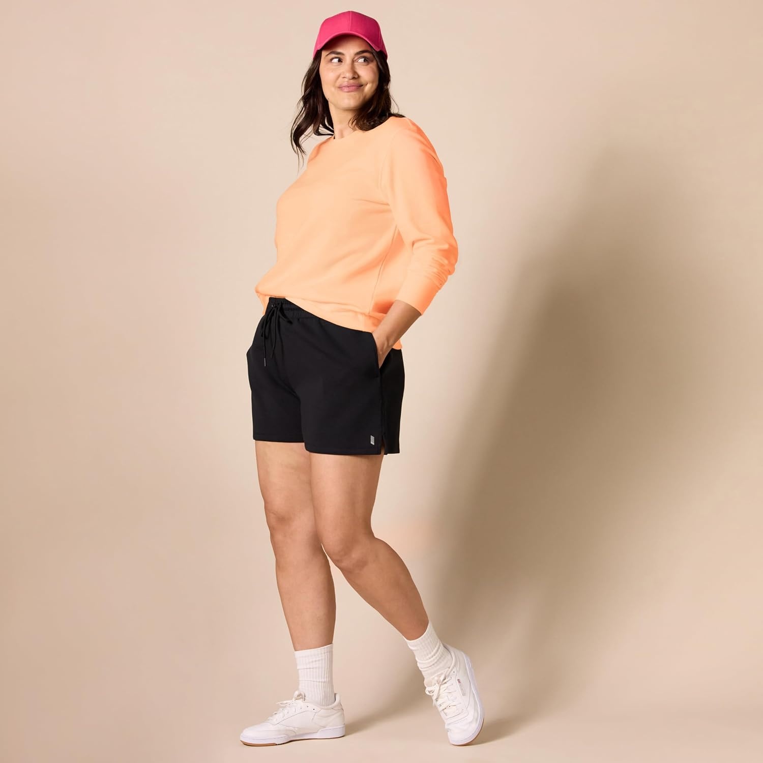 image:imageAmazon Essentials Womens Fleece Crewneck Long Sleeve Pullover Sweatshirt Available in Plus SizeCantaloupe