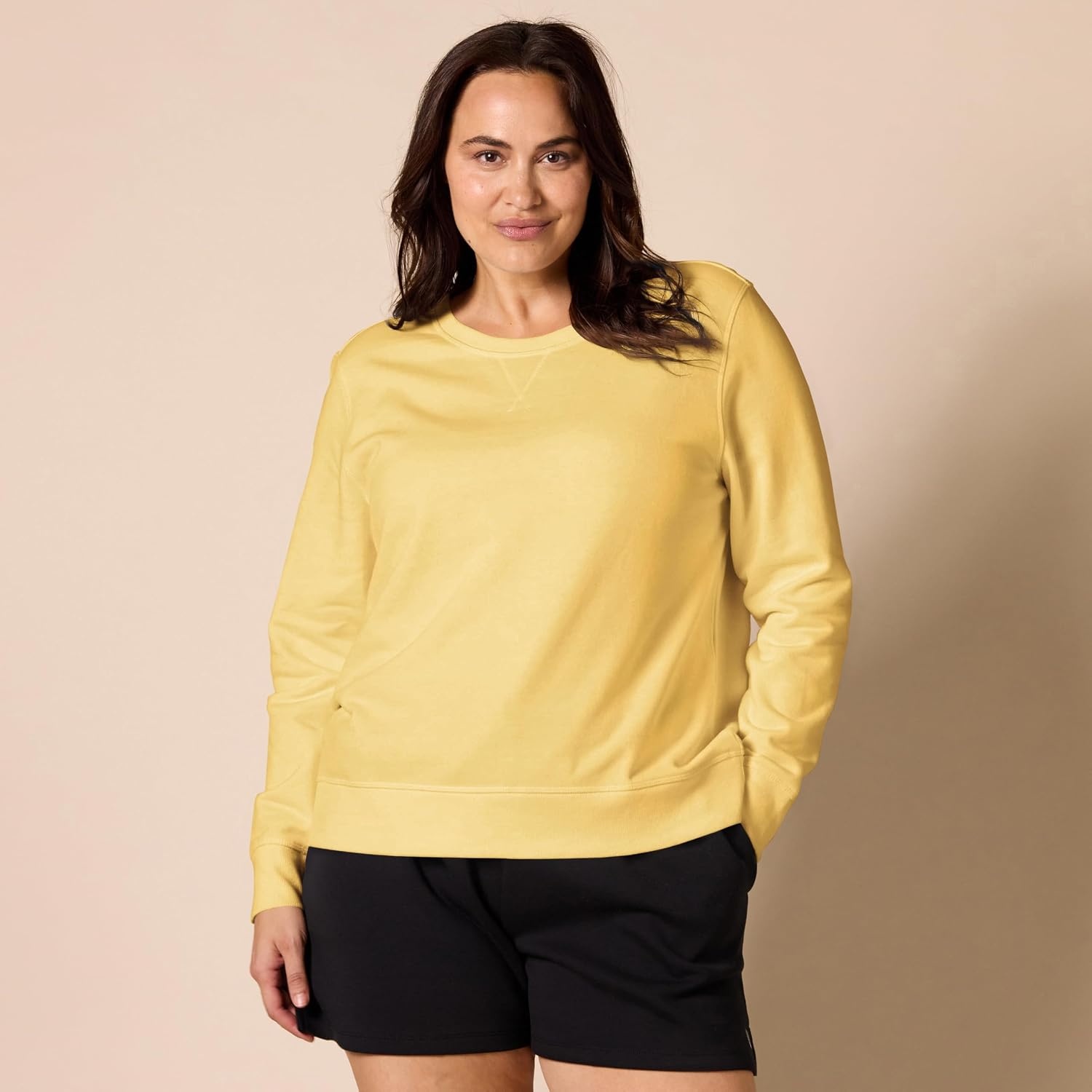 image:imageAmazon Essentials Womens Fleece Crewneck Long Sleeve Pullover Sweatshirt Available in Plus SizeDark Yellow