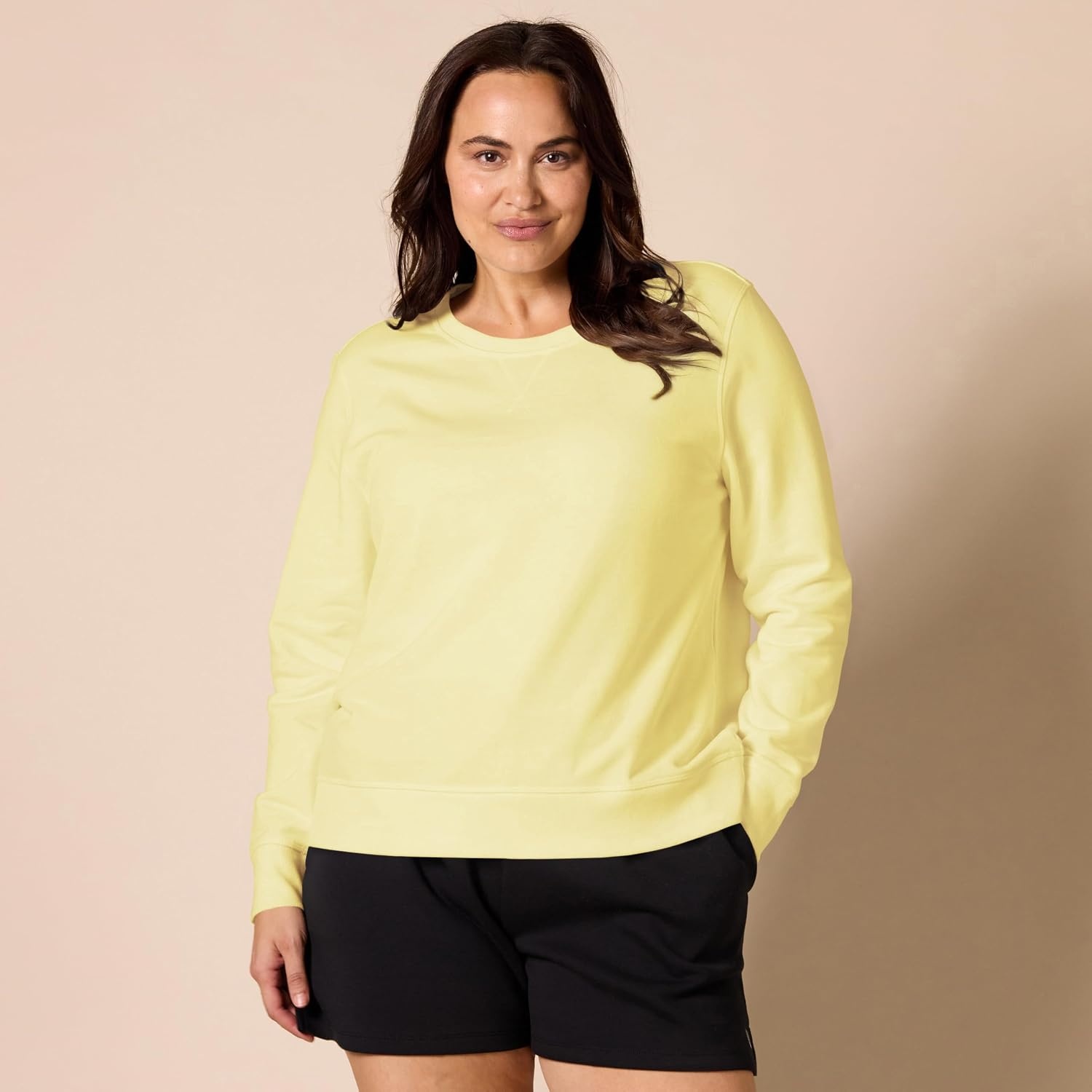 image:imageAmazon Essentials Womens Fleece Crewneck Long Sleeve Pullover Sweatshirt Available in Plus SizeLight Yellow