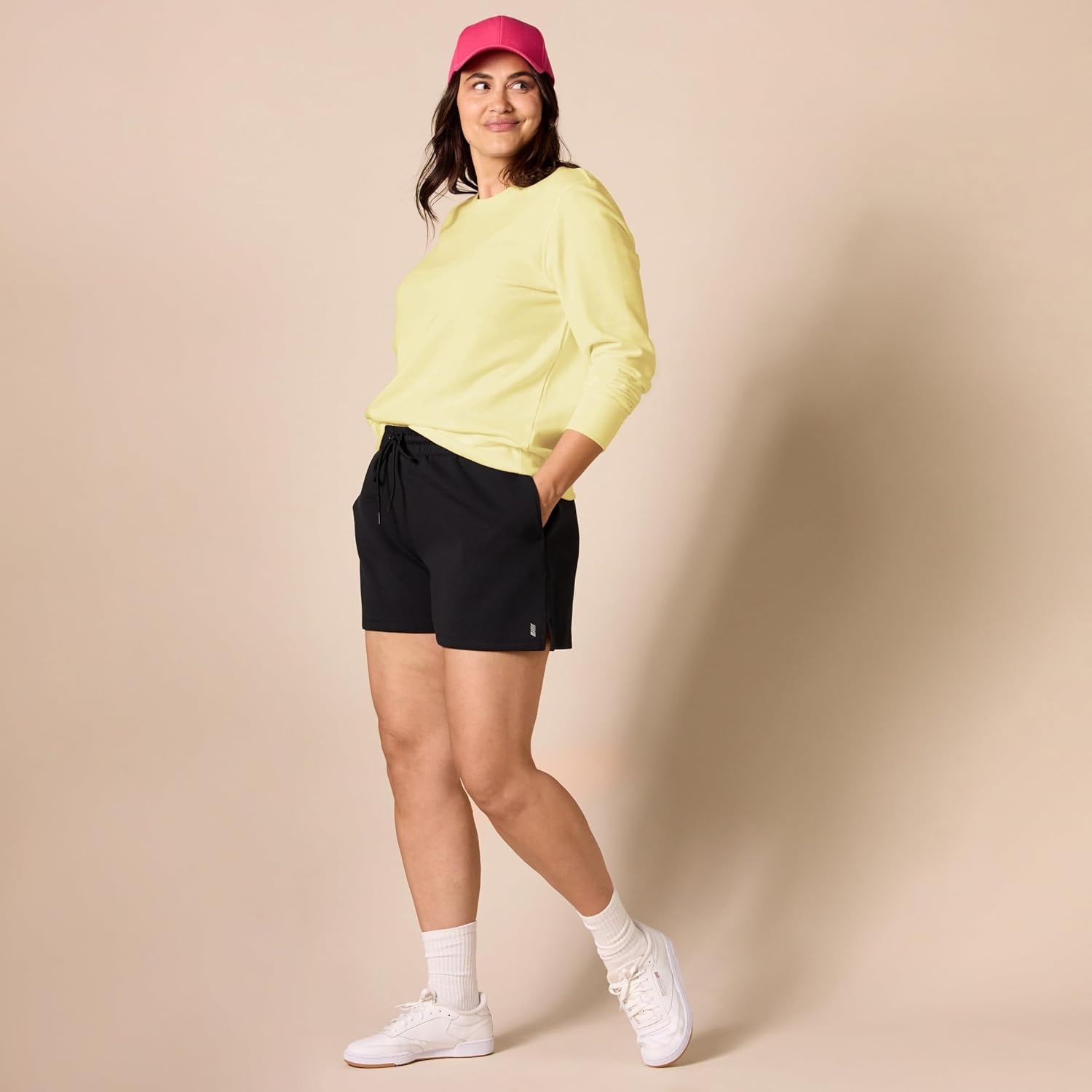 image:imageAmazon Essentials Womens Fleece Crewneck Long Sleeve Pullover Sweatshirt Available in Plus SizeLight Yellow