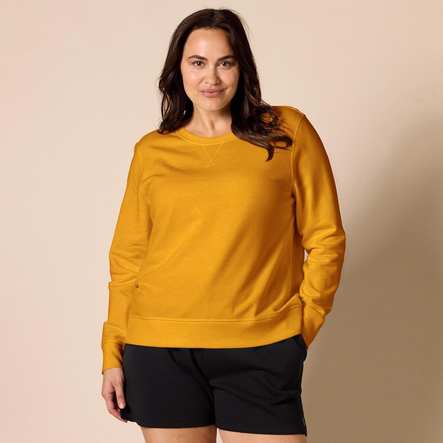image:imageAmazon Essentials Womens Fleece Crewneck Long Sleeve Pullover Sweatshirt Available in Plus SizeMustard Yellow