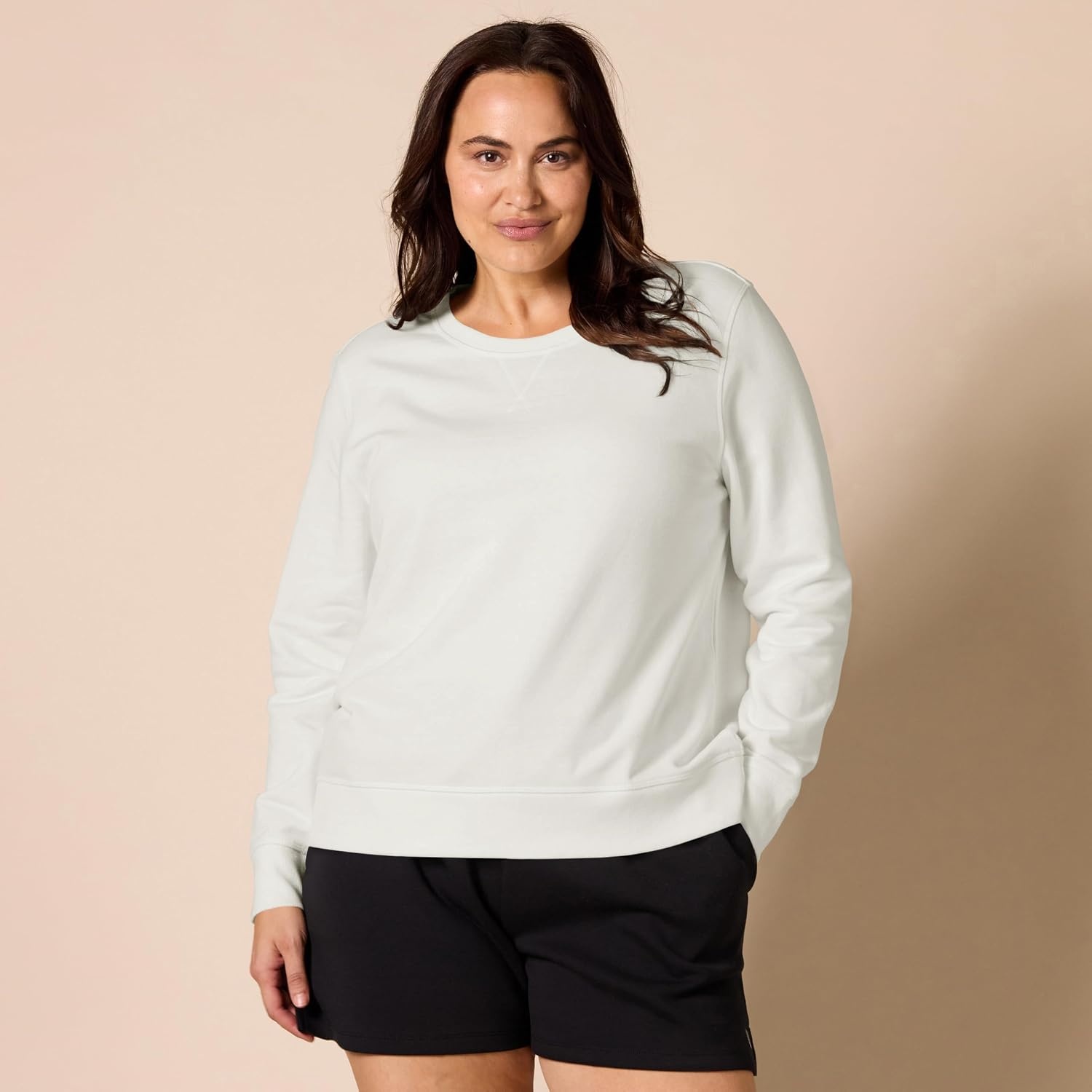 image:imageAmazon Essentials Womens Fleece Crewneck Long Sleeve Pullover Sweatshirt Available in Plus SizeWhite