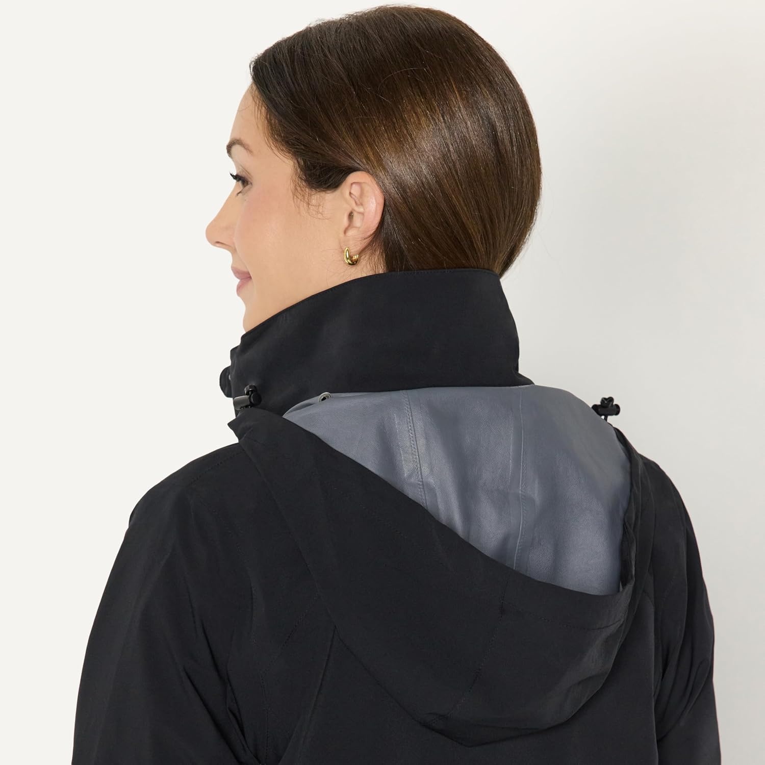 image:imageAmazon Essentials Womens RegularFit Lightweight Waterproof Long Hooded Rain JacketBlack