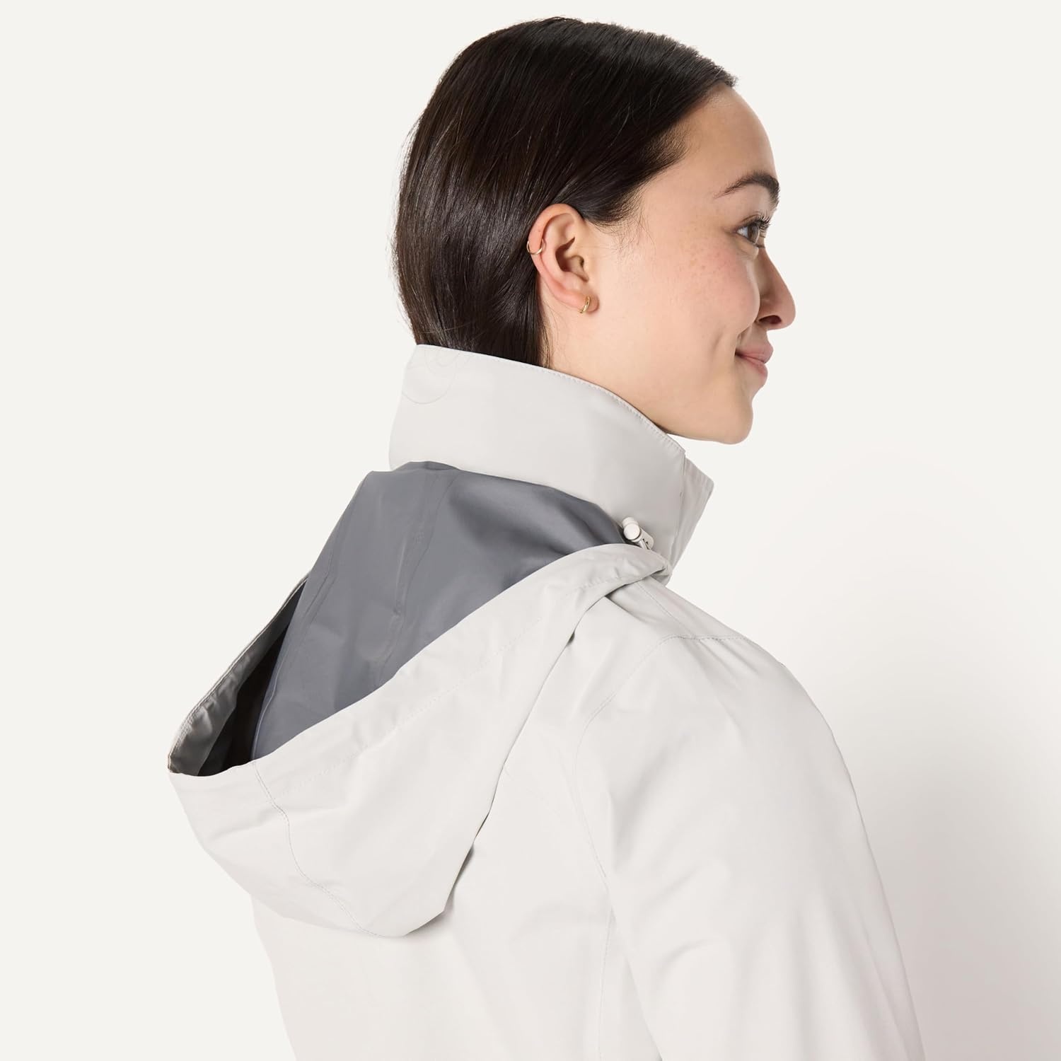 image:imageAmazon Essentials Womens RegularFit Lightweight Waterproof Long Hooded Rain JacketEggshell White