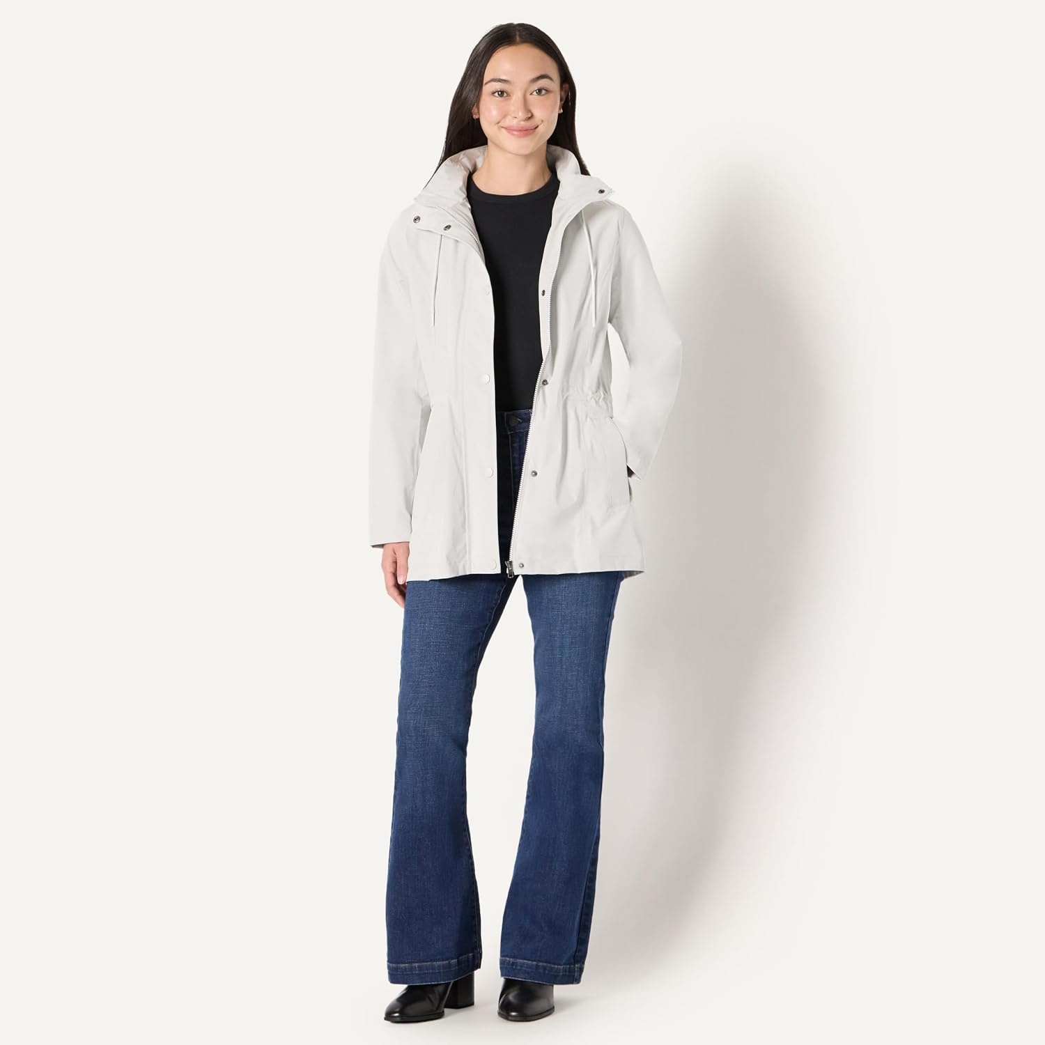 image:imageAmazon Essentials Womens RegularFit Lightweight Waterproof Long Hooded Rain JacketEggshell White