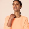 Amazon Essentials Women’s Fleece Crewneck Long Sleeve Pullover Sweatshirt (Available in Plus Size)(Cantaloupe)