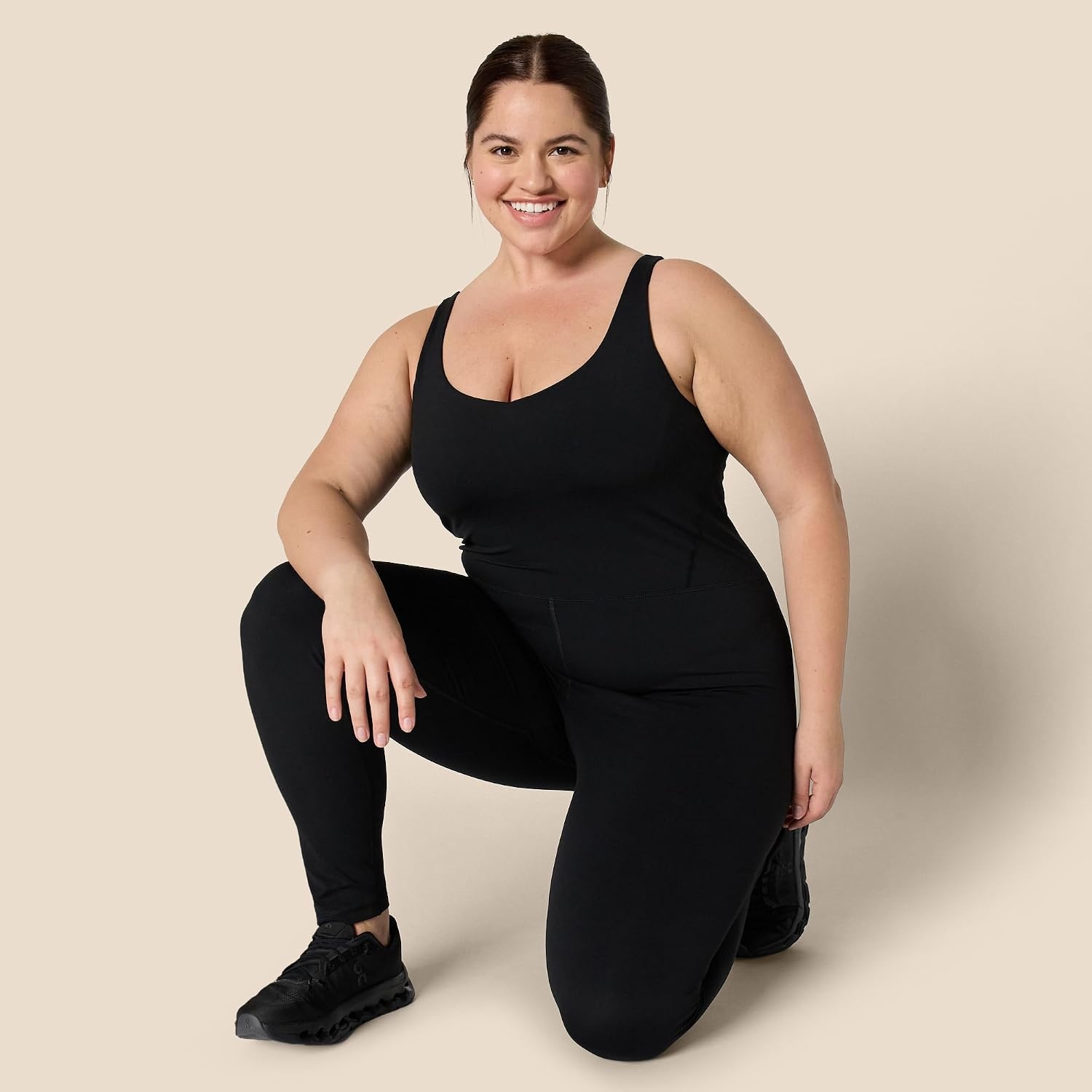 image:imageAmazon Essentials Womens Active Formflex Buttery Soft One Piece Full Length Workout Jumpsuit with BuiltIn BraBlack
