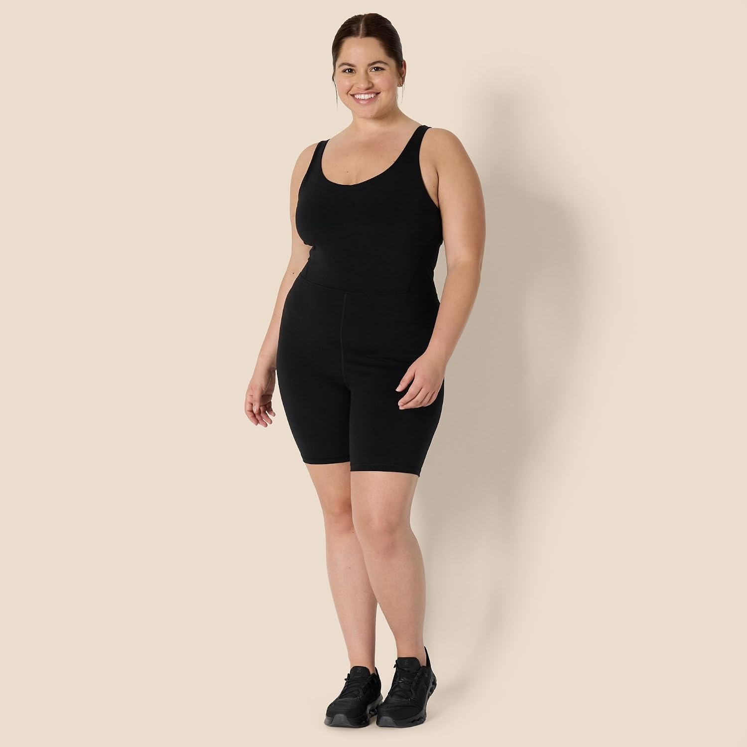 image:imageAmazon Essentials Womens Active Formflex Buttery Soft One Piece Shorts Romper Jumpsuit with BuiltIn BraBlack