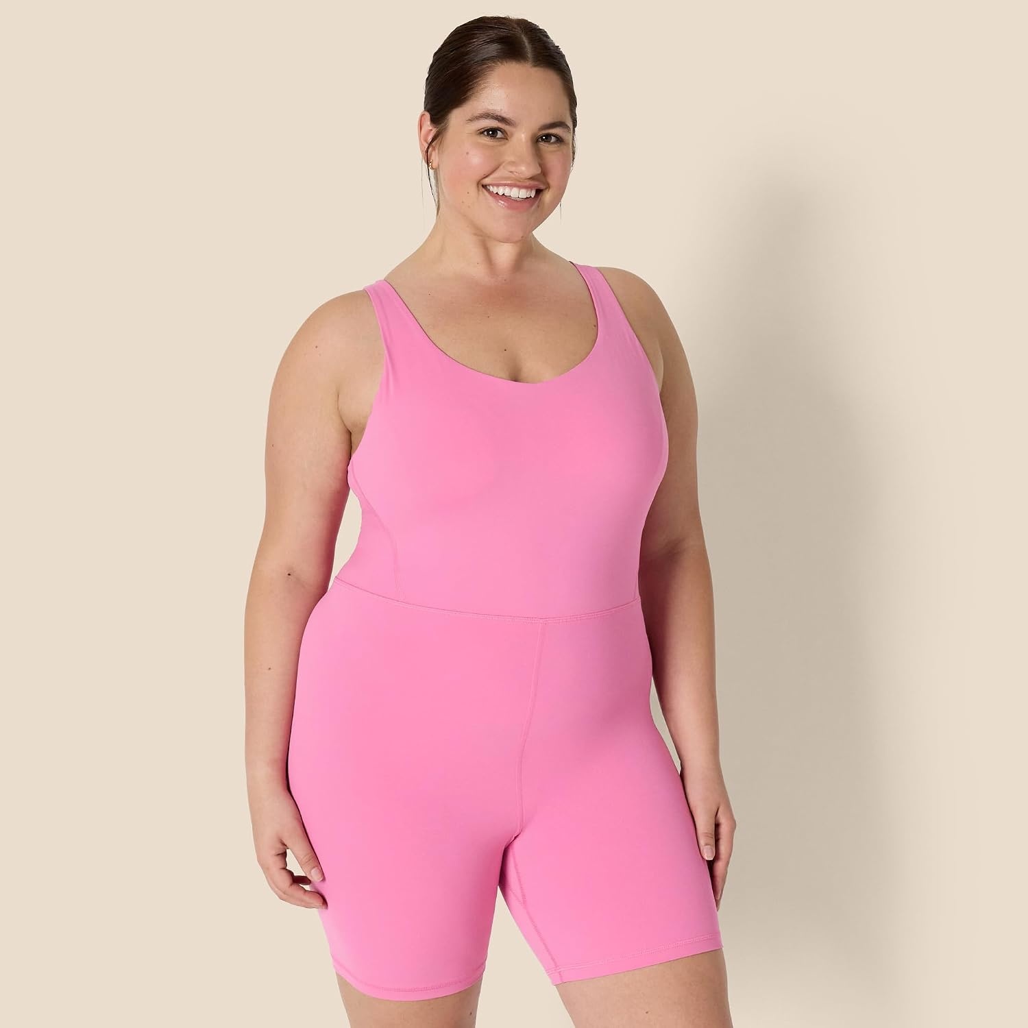image:imageAmazon Essentials Womens Active Formflex Buttery Soft One Piece Shorts Romper Jumpsuit with BuiltIn BraPink