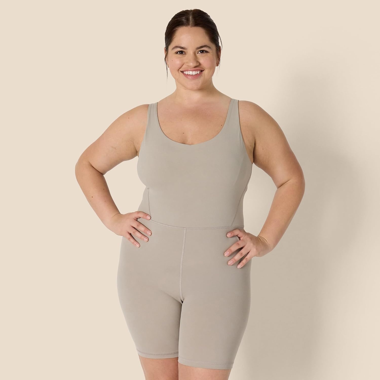 image:imageAmazon Essentials Womens Active Formflex Buttery Soft One Piece Shorts Romper Jumpsuit with BuiltIn BraTaupe