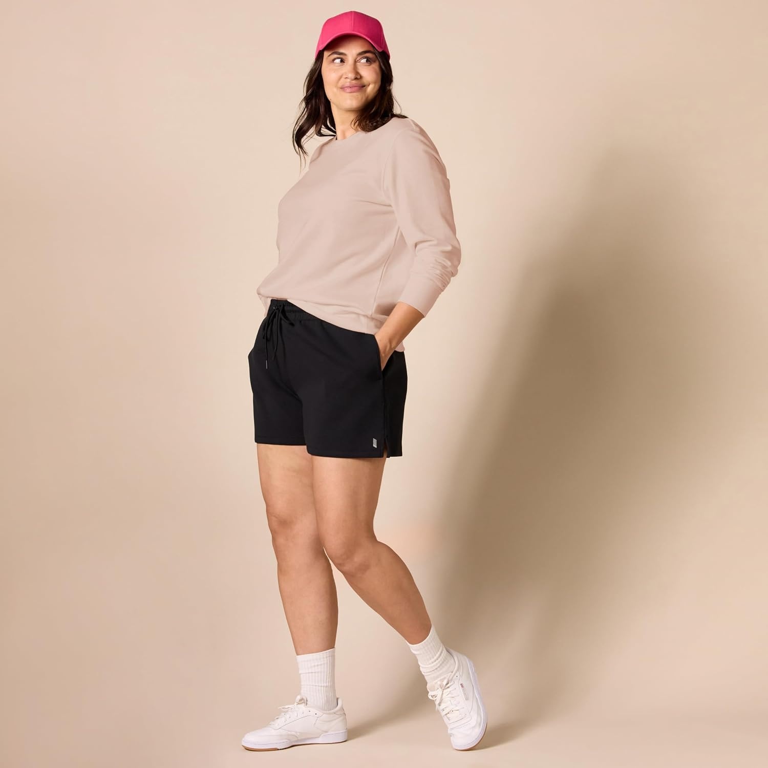image:imageAmazon Essentials Womens Fleece Crewneck Long Sleeve Pullover Sweatshirt Available in Plus SizeLight Pink